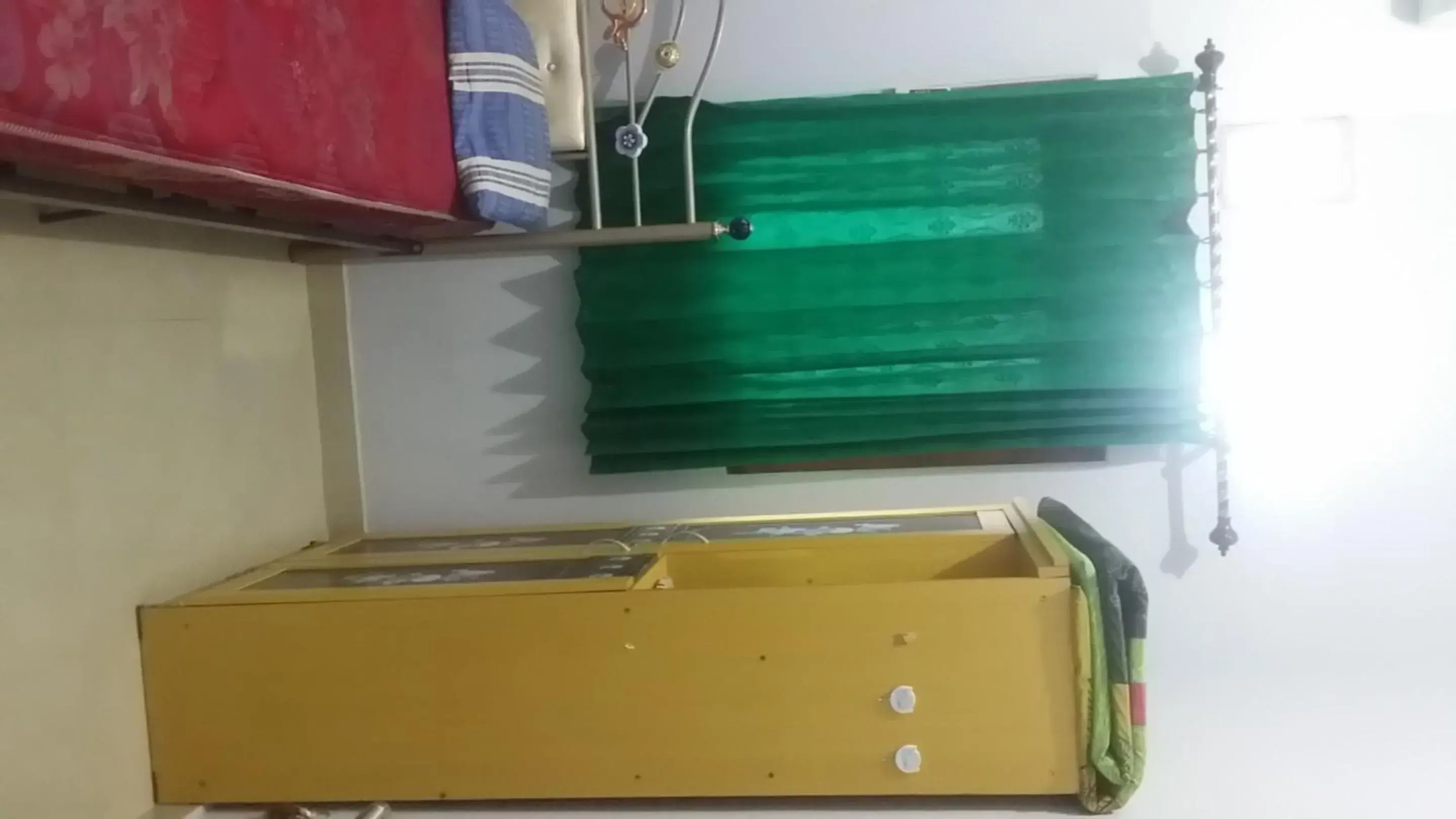 Bedroom in Hotel O Guest House Bu Iin Syariah Bedroom in Hotel O Guest House Bu Iin Syariah