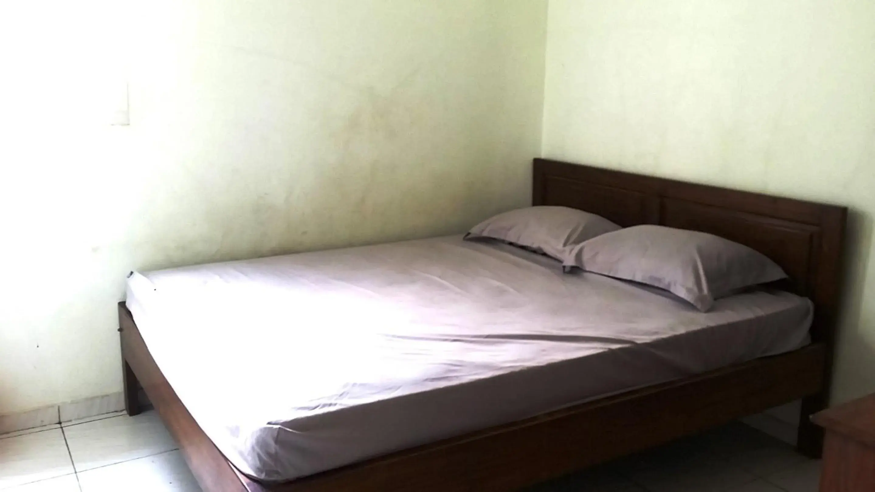 Bedroom, Bed in Hotel O Guest House Bu Iin Syariah Bedroom, Bed in Hotel O Guest House Bu Iin Syariah