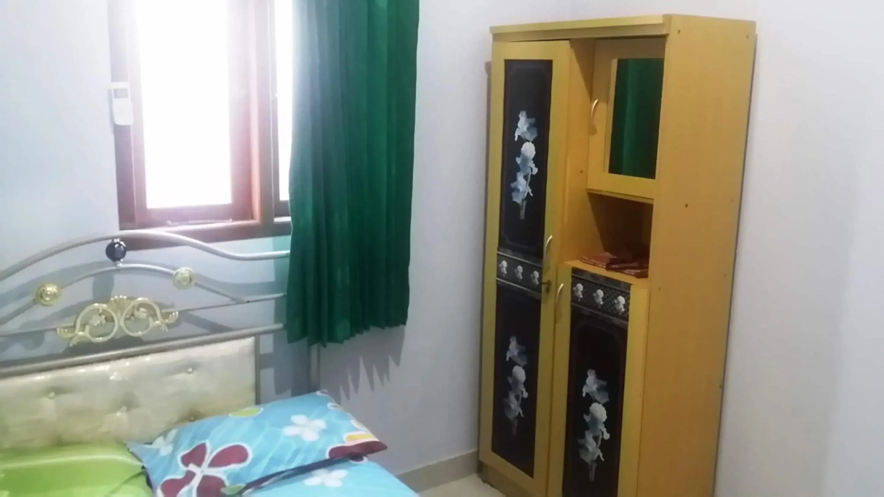Bedroom, Bed in Hotel O Guest House Bu Iin Syariah Bedroom, Bed in Hotel O Guest House Bu Iin Syariah