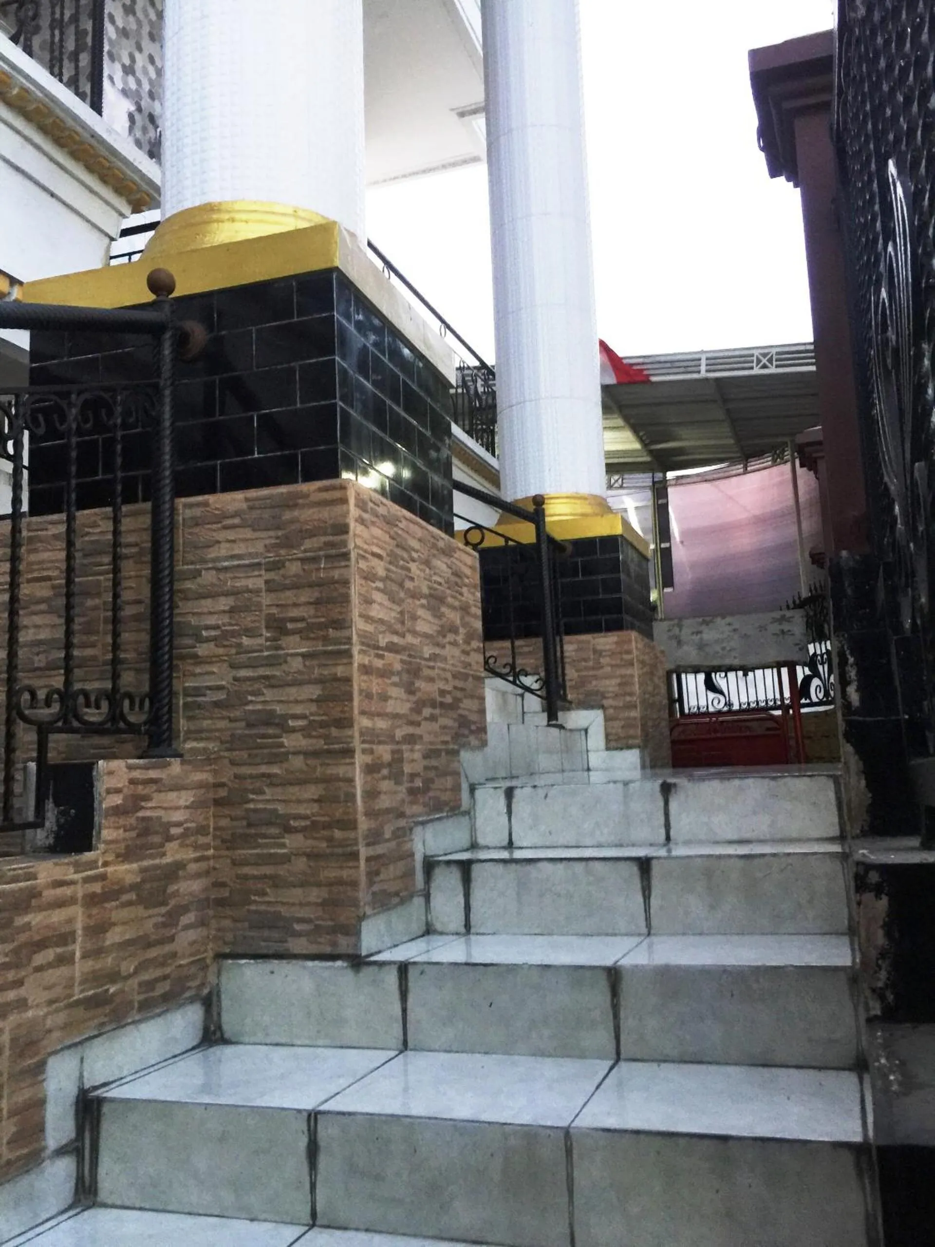 Lobby or reception in Hotel O Guest House Bu Iin Syariah