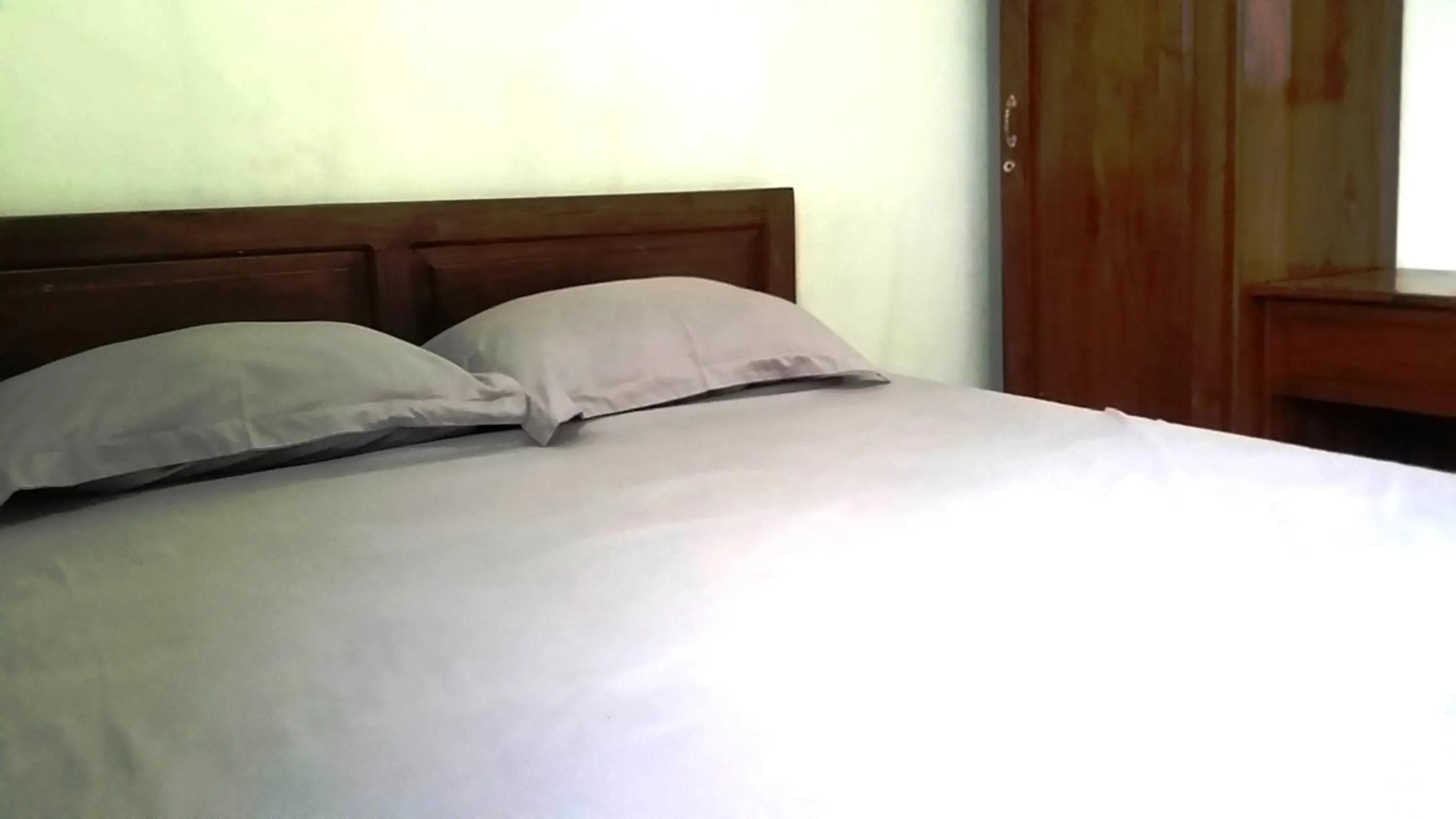 Bedroom, Bed in Hotel O Guest House Bu Iin Syariah