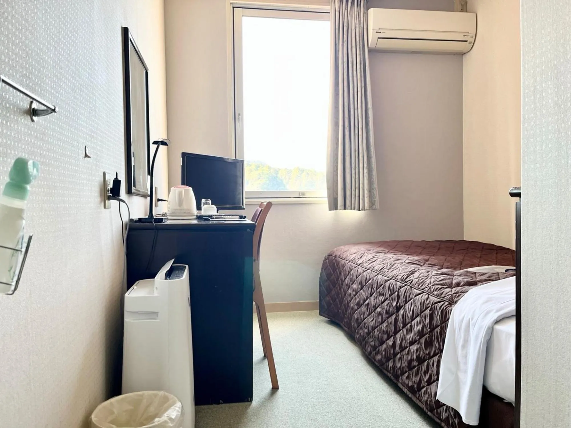 Photo of the whole room, Bed in Nakamura Daiichi Hotel