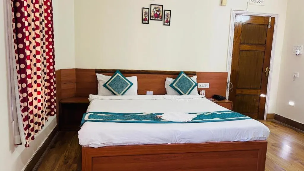 Bed in Hotel Vinayak