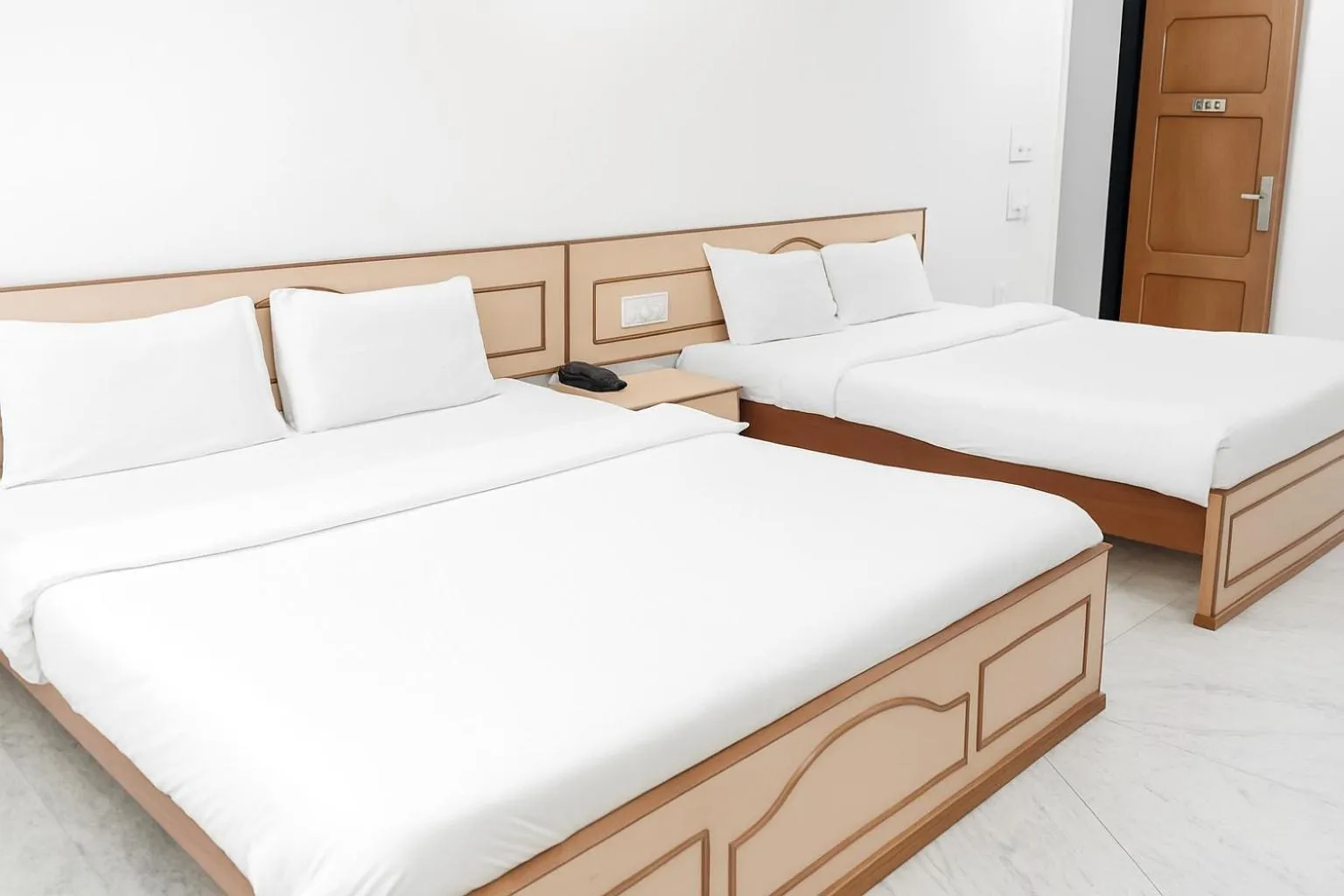 Bed in Hotel Vinayak