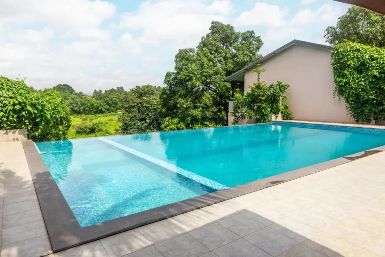 Swimming pool in River Estates Resort, Restaurant & Spa by Vibescapes Swimming pool in River Estates Resort, Restaurant & Spa by Vibescapes