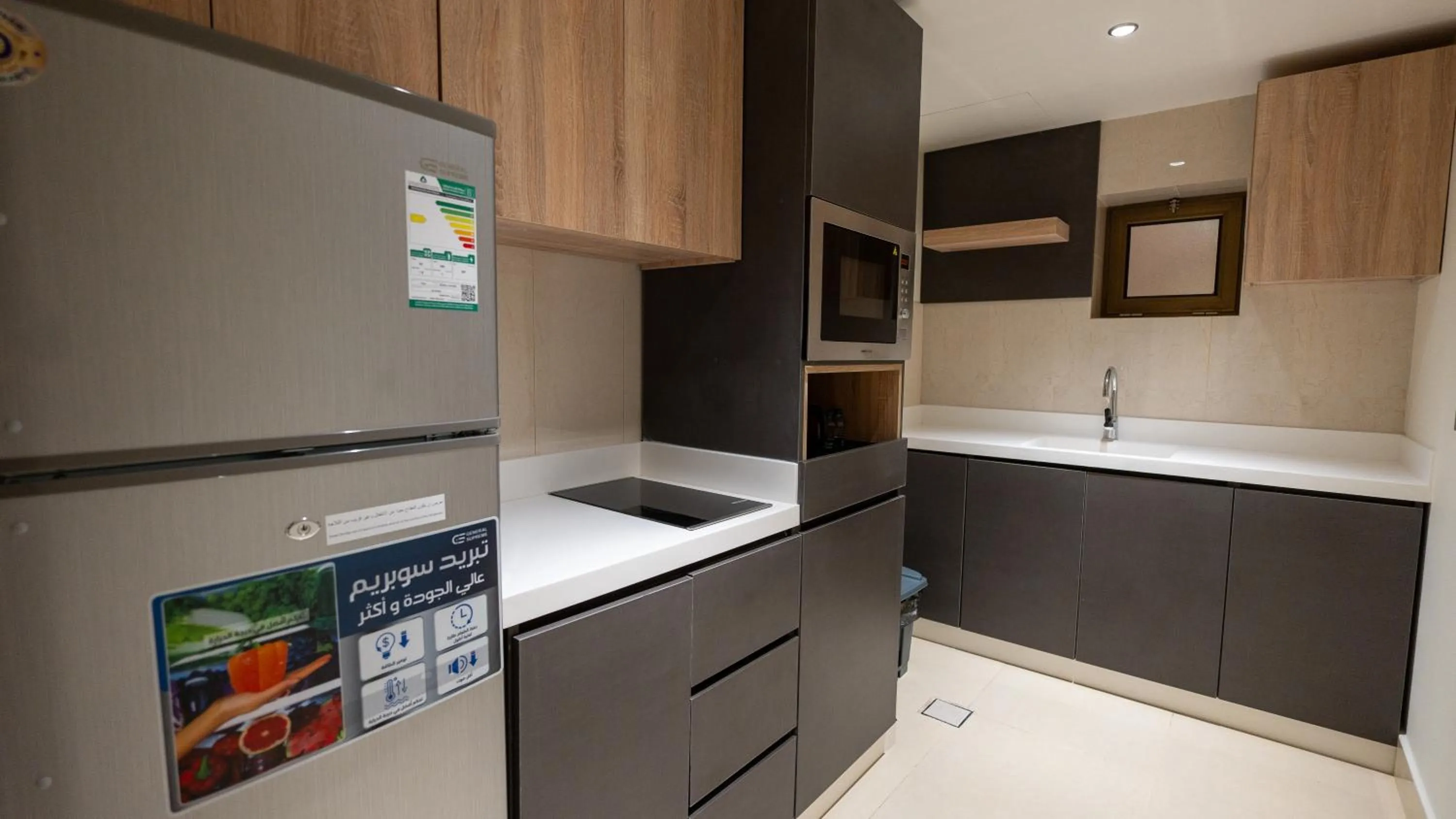 Kitchen or kitchenette in Maskan Alolya Serviced Apartment