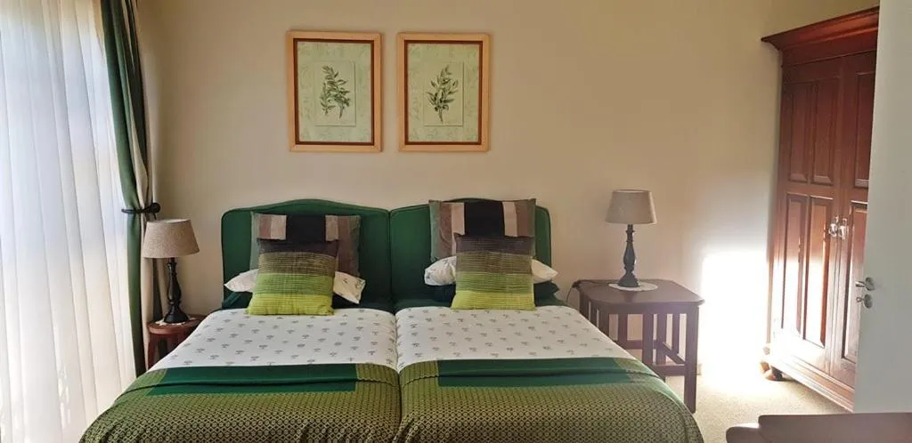 Bed in Hillscapes Guesthouse
