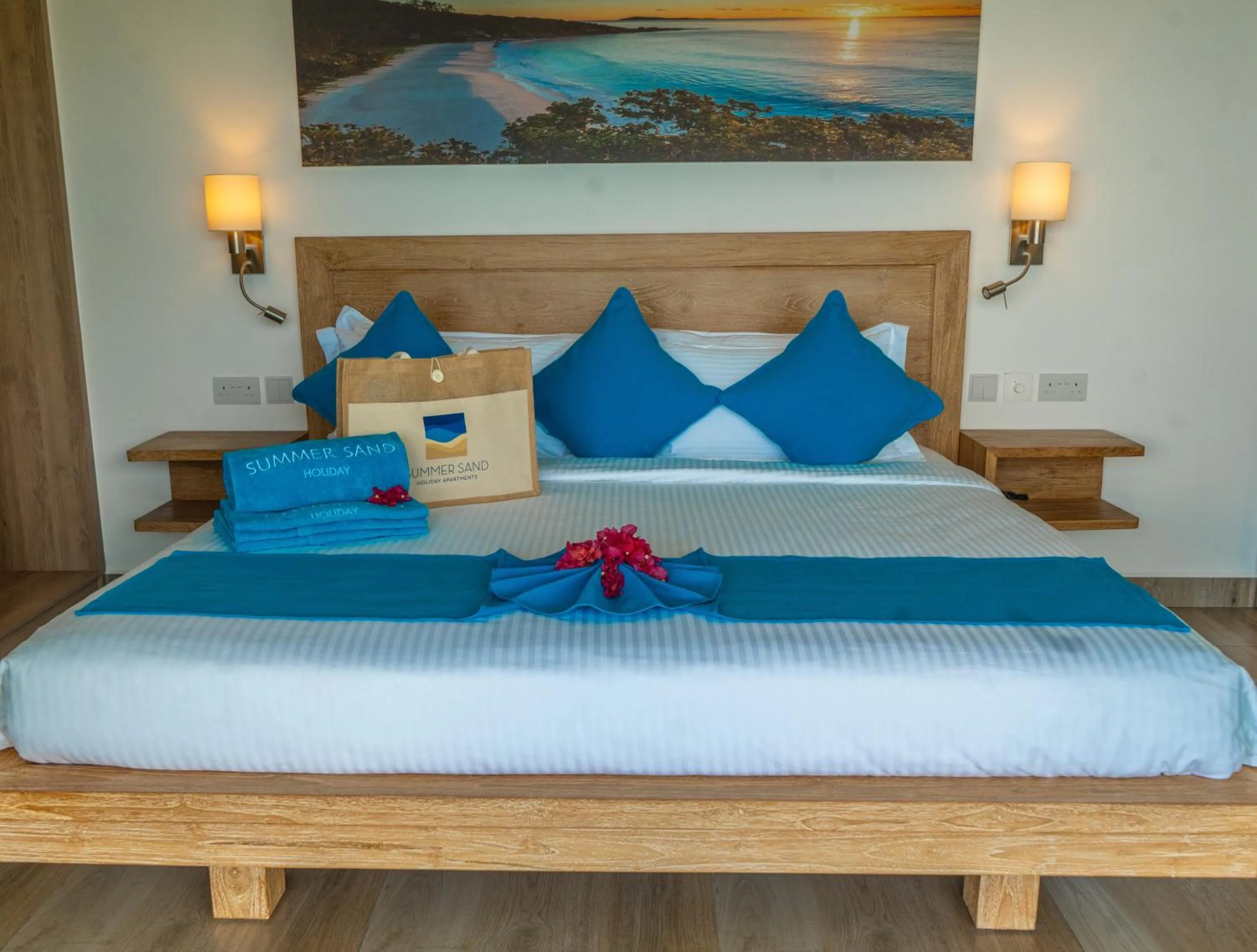 Bed in Summer Sand Holiday Apartments