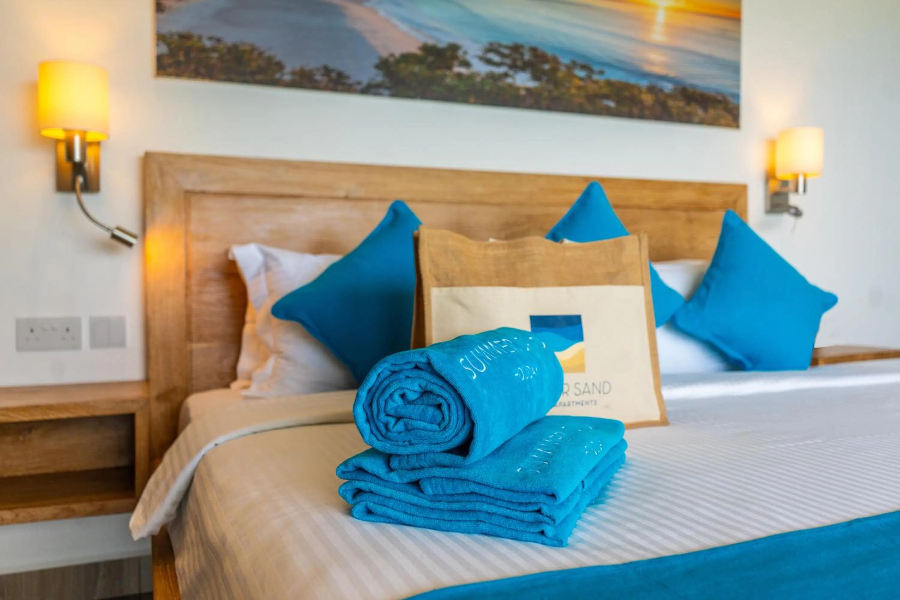 Bed in Summer Sand Holiday Apartments