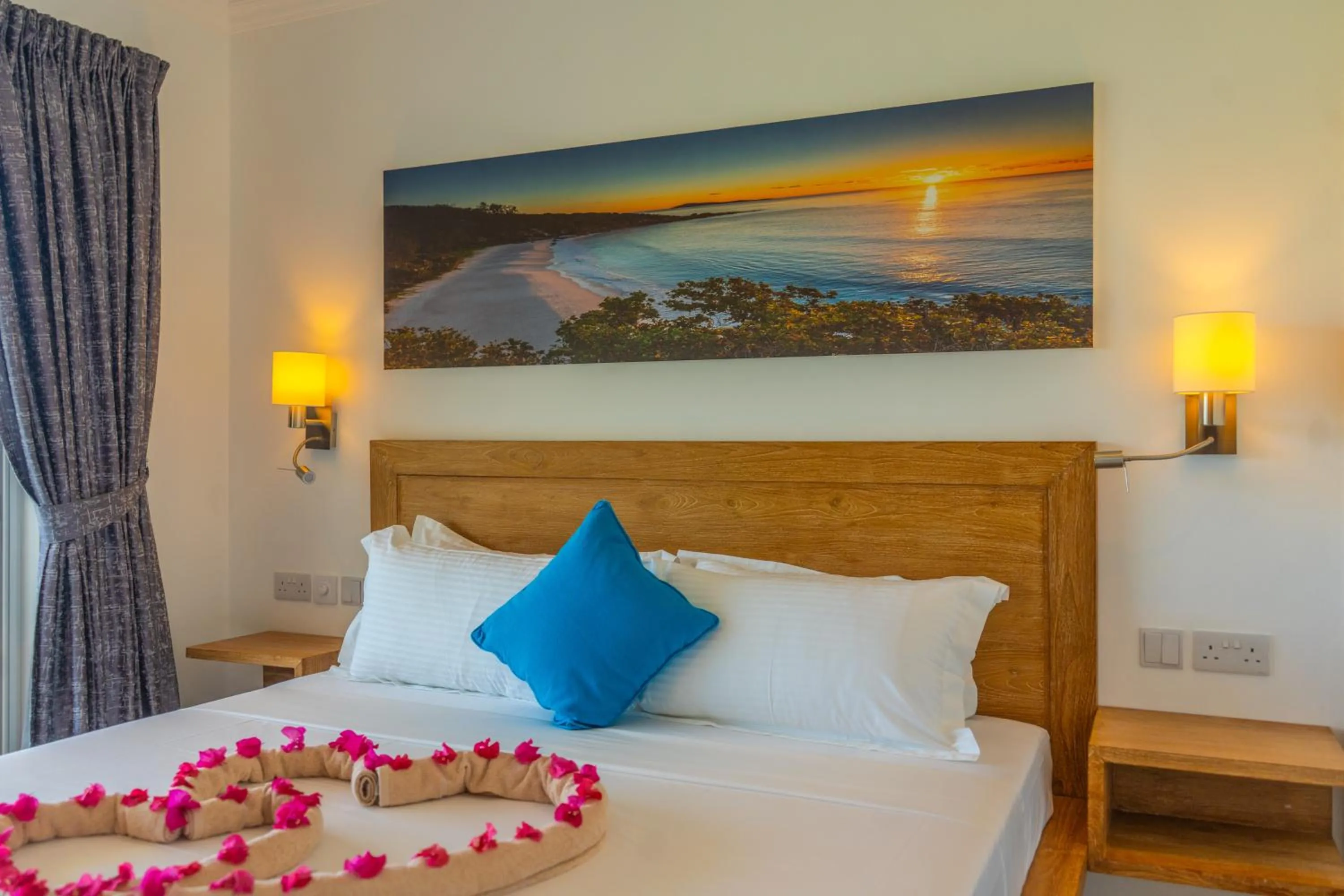 Bed in Summer Sand Holiday Apartments