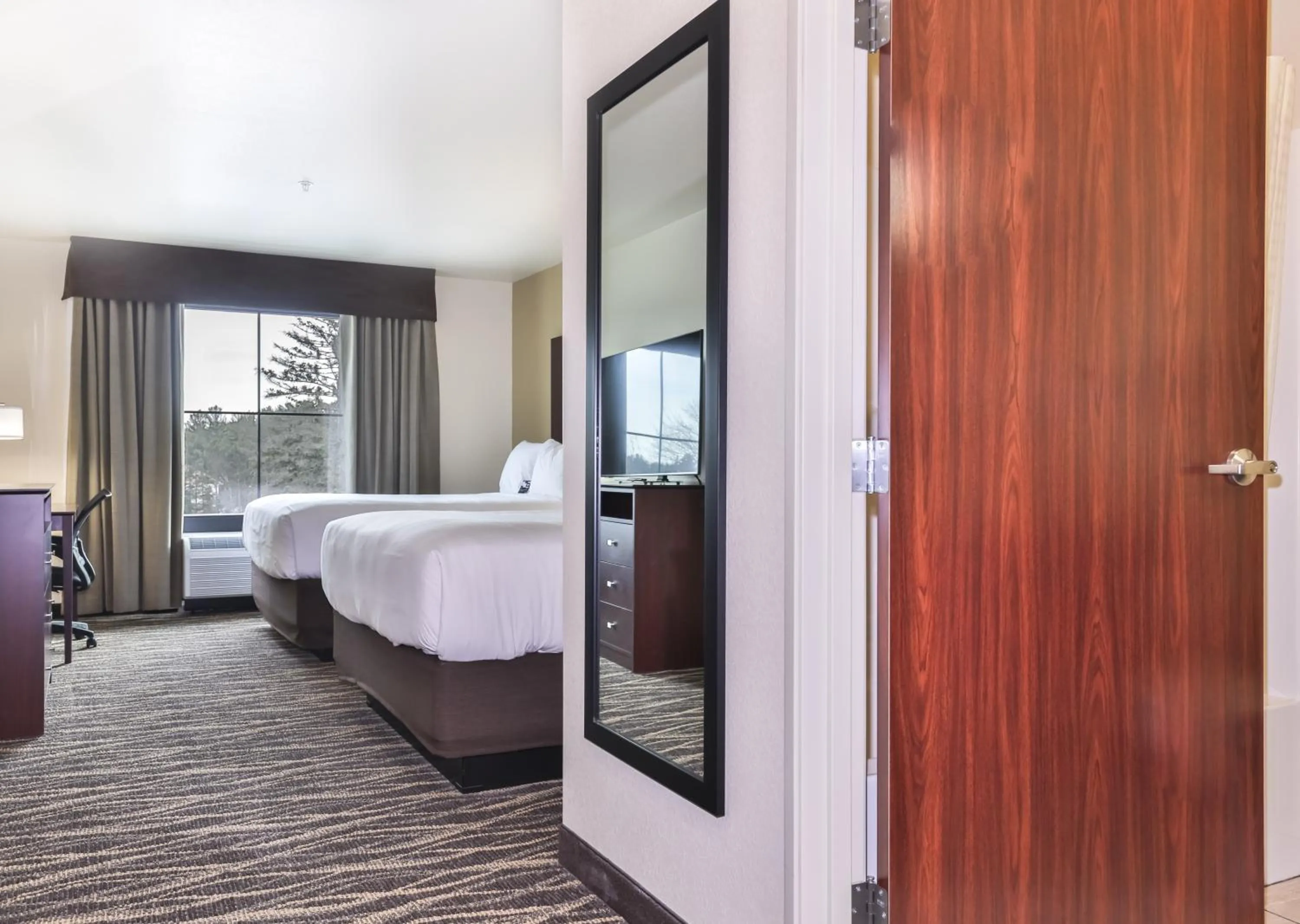 Bedroom, Bed in Cobblestone Hotel & Suites - Rhinelander