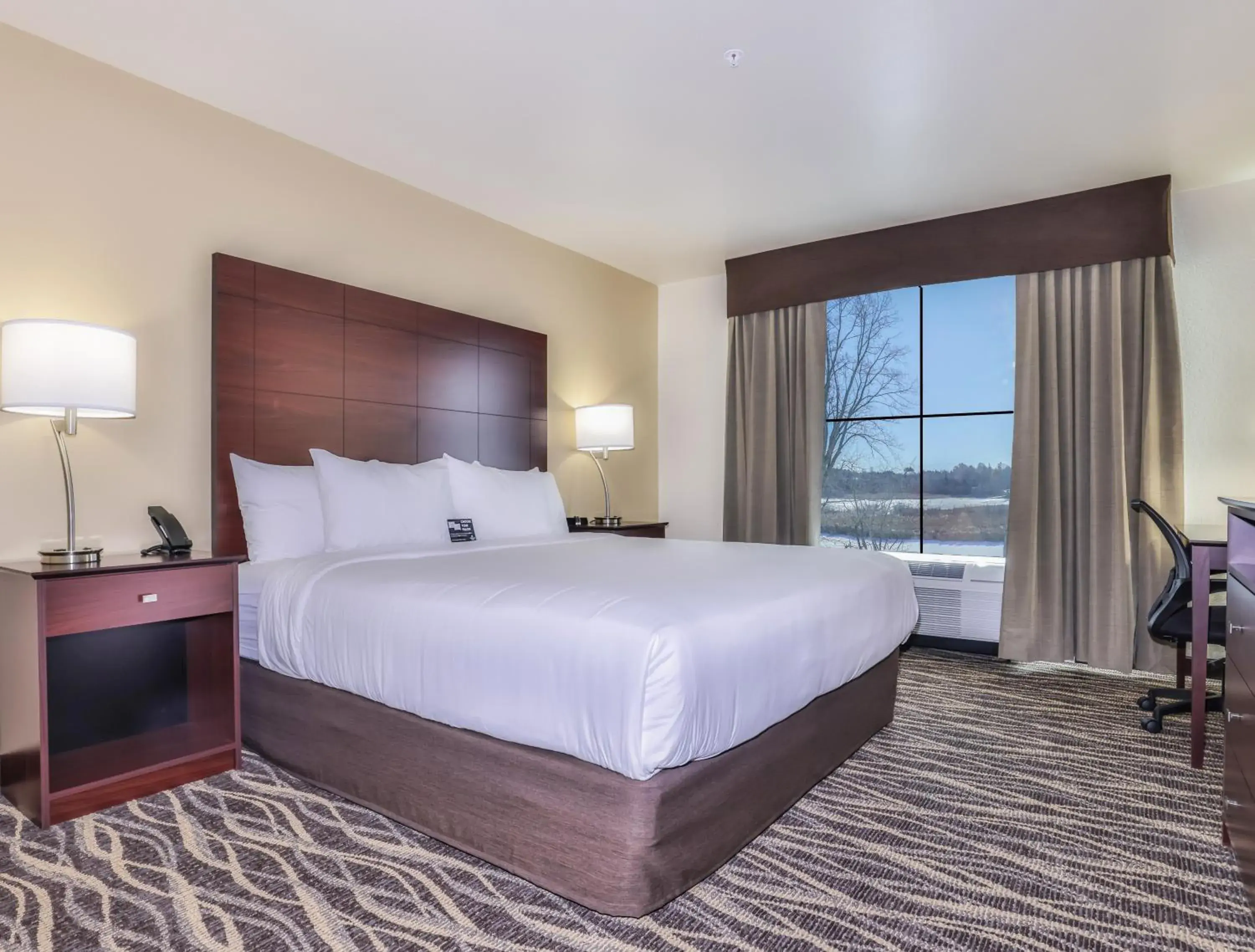 Bed in Cobblestone Hotel & Suites - Rhinelander Bed in Cobblestone Hotel & Suites - Rhinelander