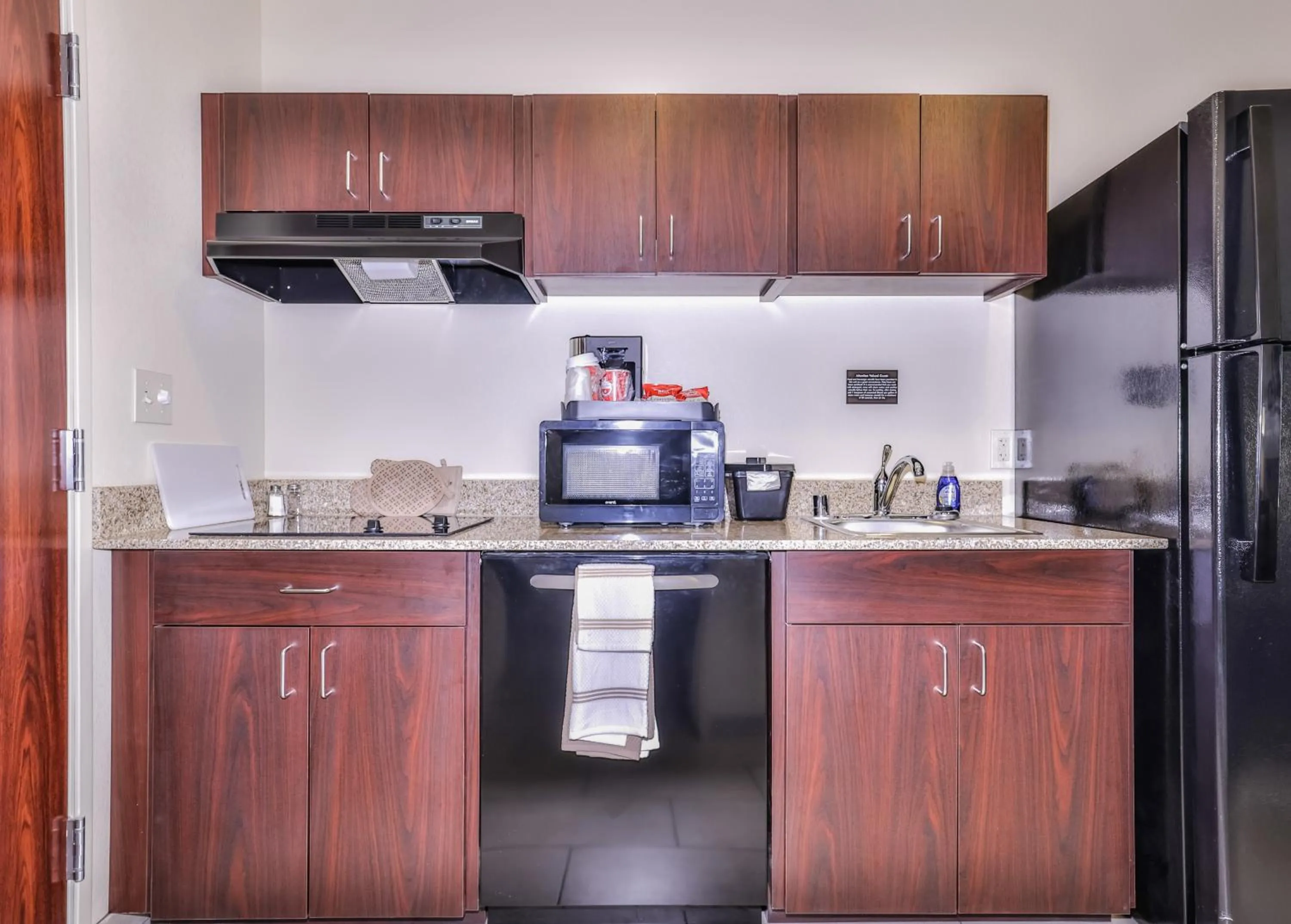 Kitchen or kitchenette in Cobblestone Hotel & Suites - Rhinelander