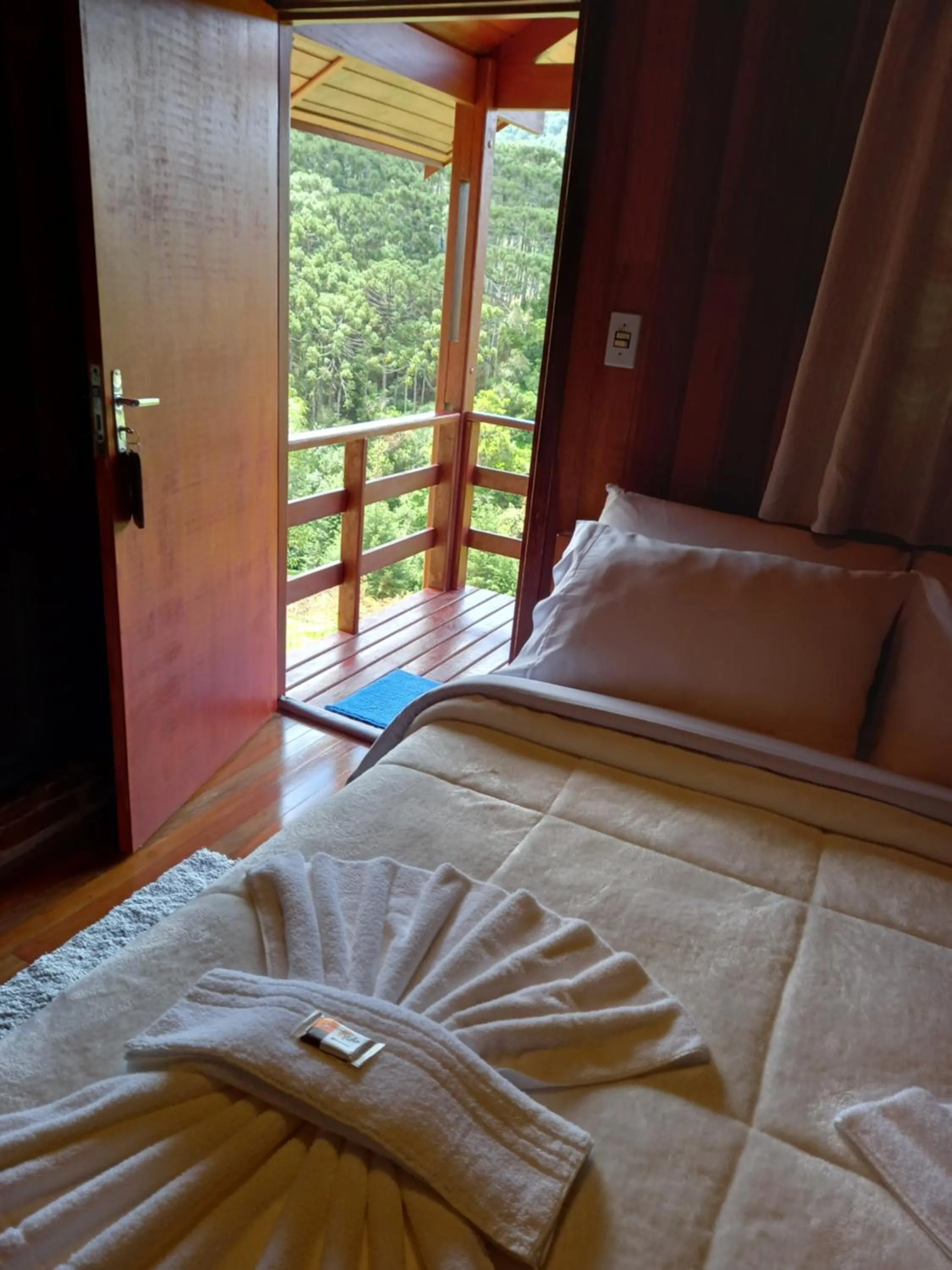 Bed in Pousada Som das Aguas