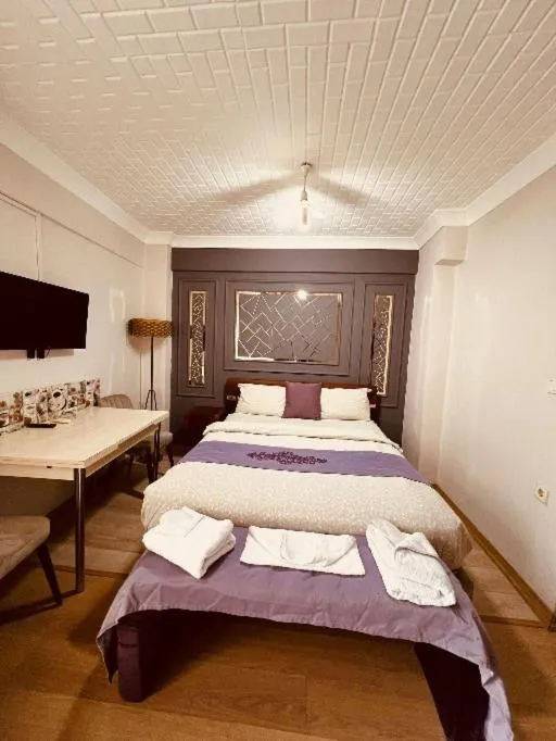 Bed in KANARYA SUİT OTELL