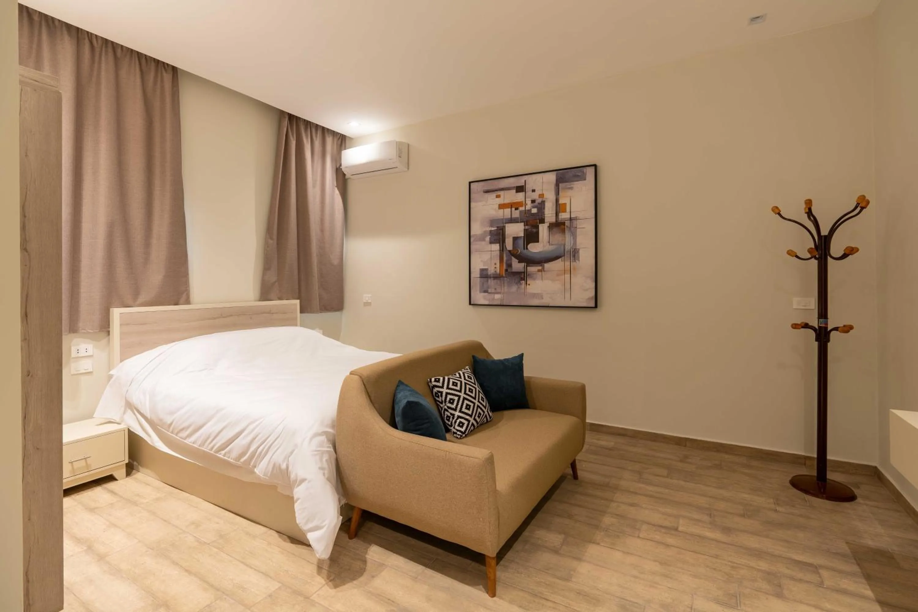 Bed in Sleep Inn Apart-Hotel