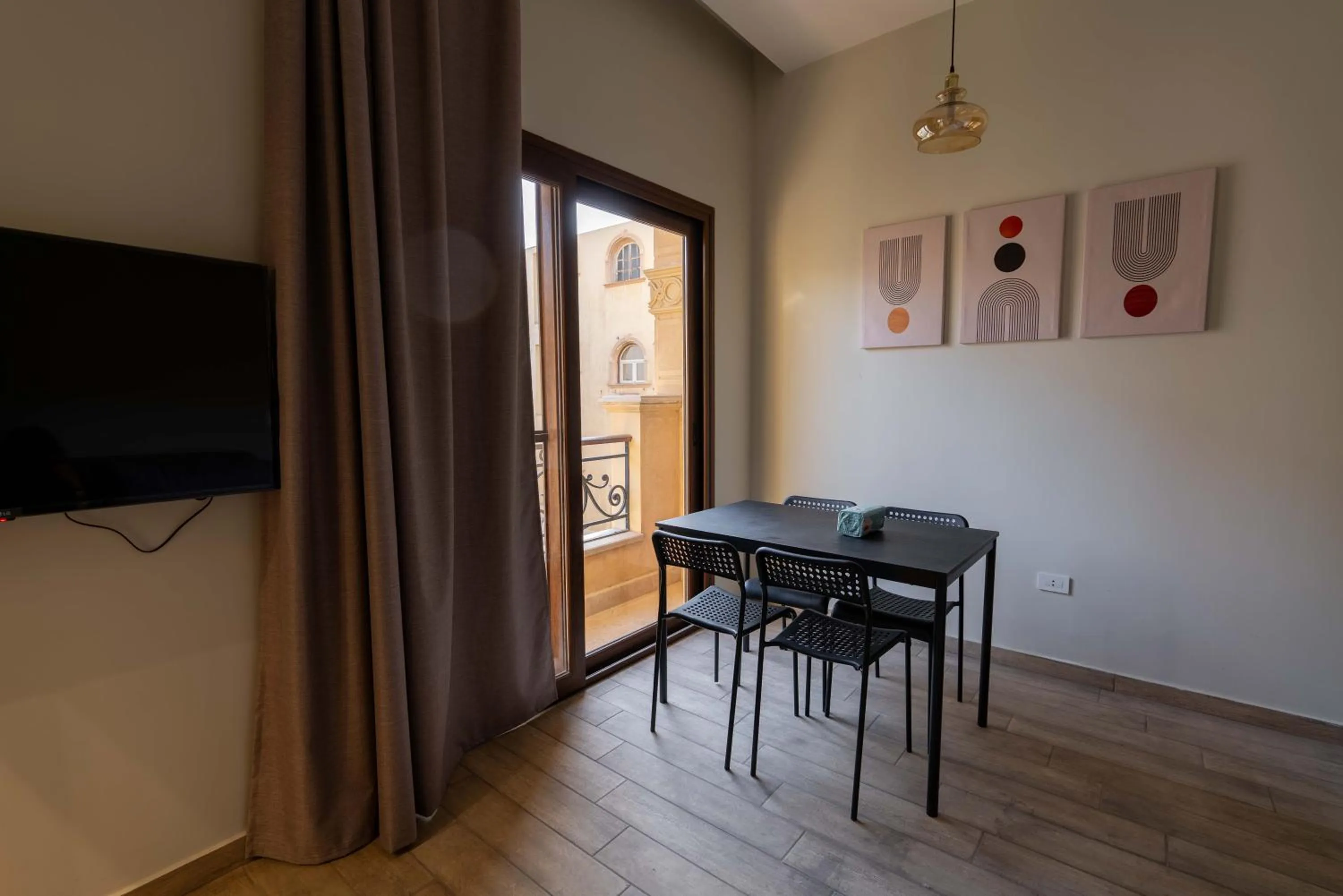 TV and multimedia in Sleep Inn Apart-Hotel