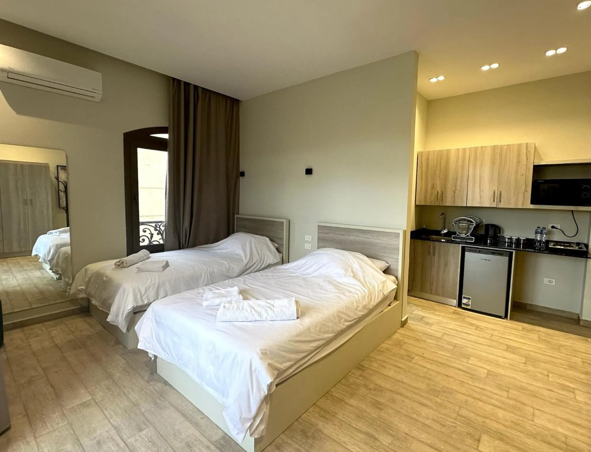 Bed in Sleep Inn Apart-Hotel