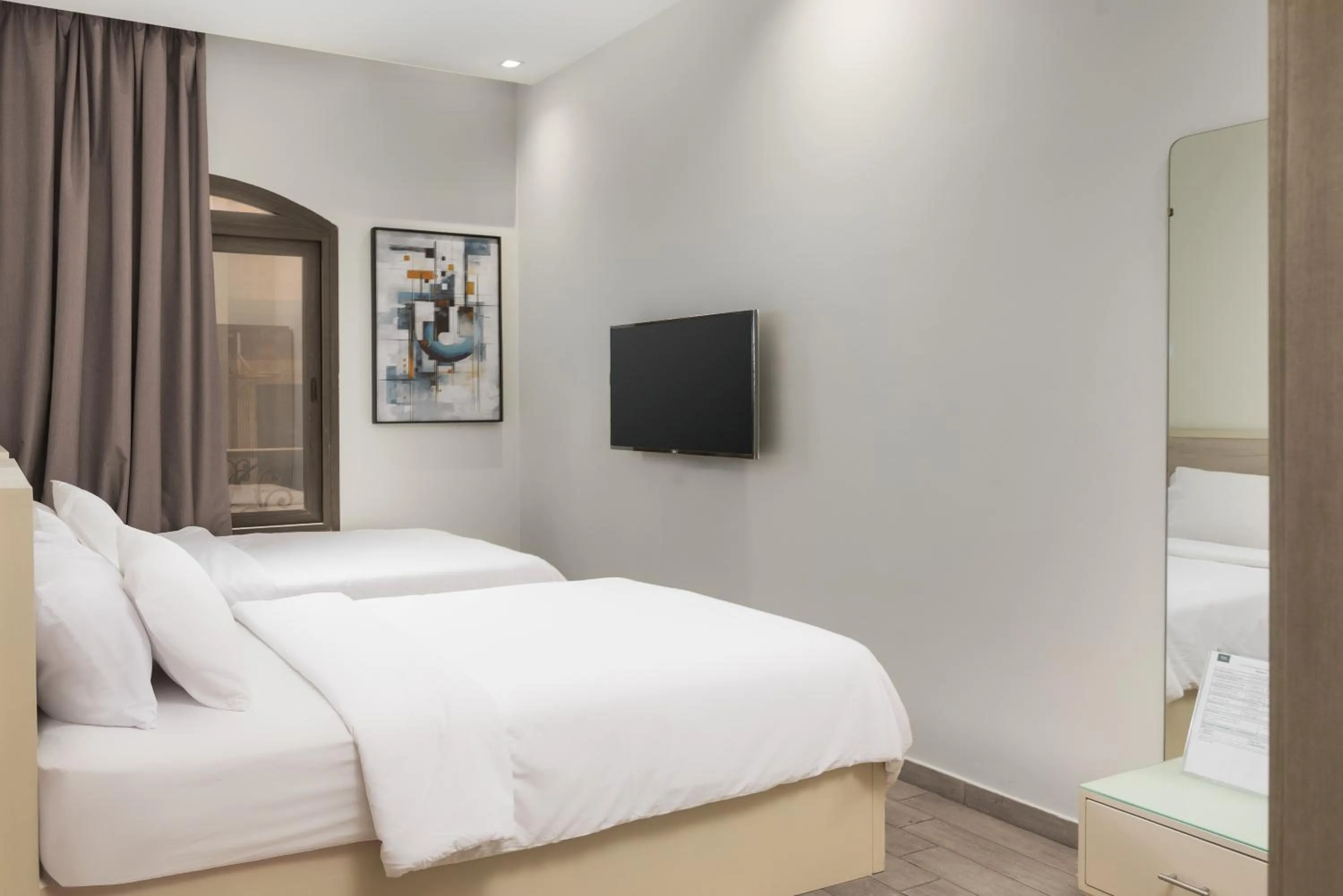 Bed in Sleep Inn Apart-Hotel