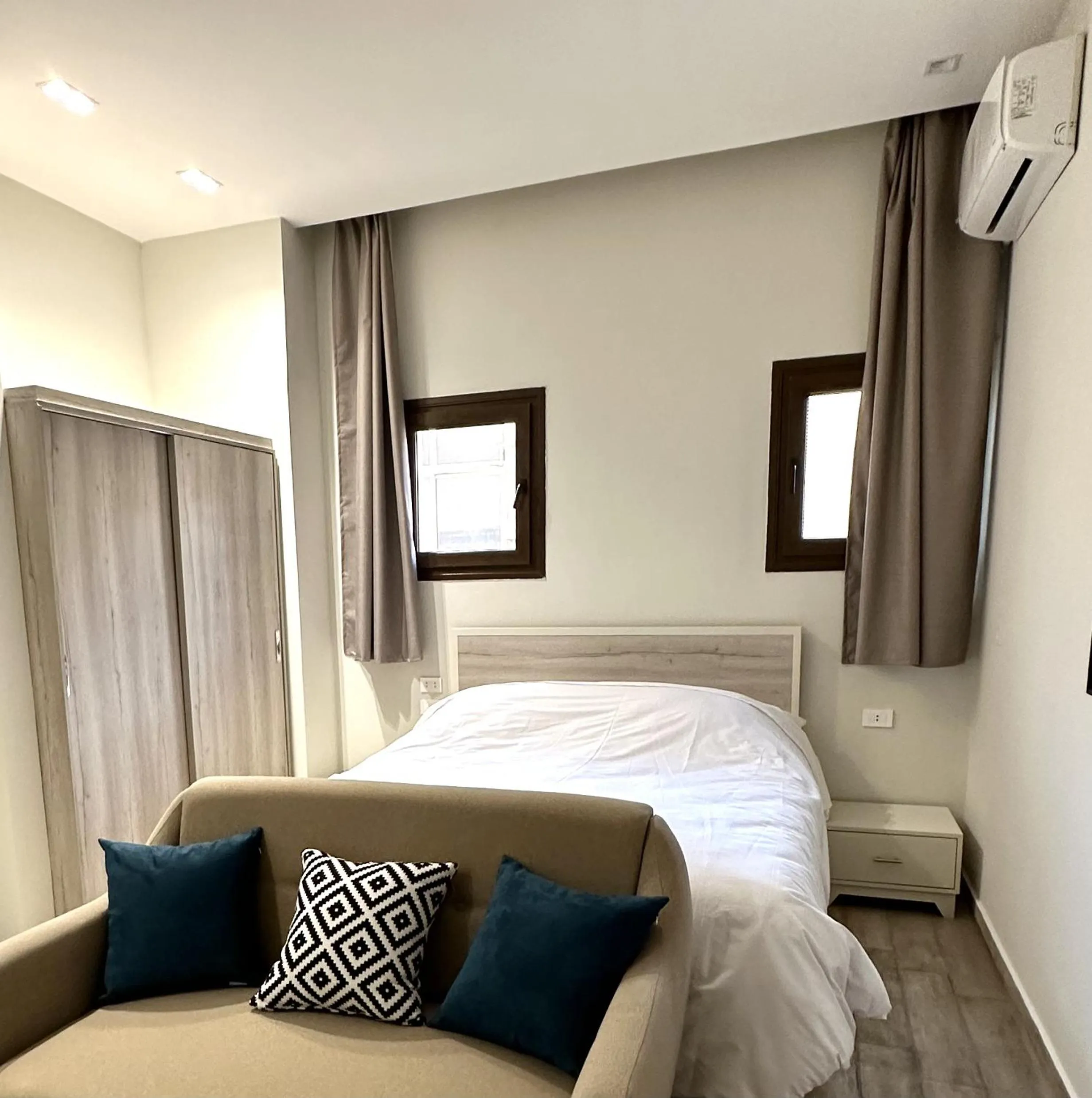 Bed in Sleep Inn Apart-Hotel