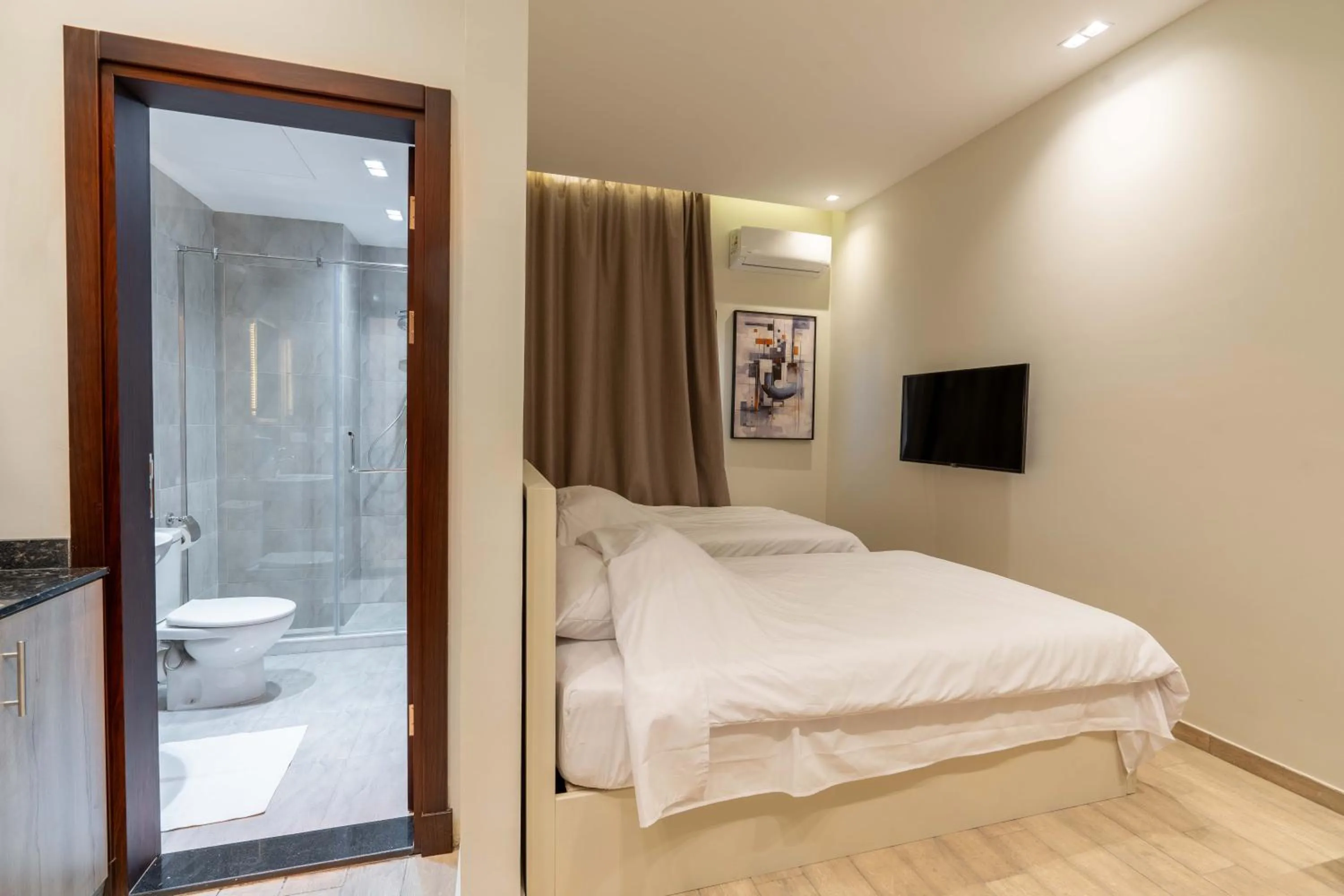 Bed in Sleep Inn Apart-Hotel