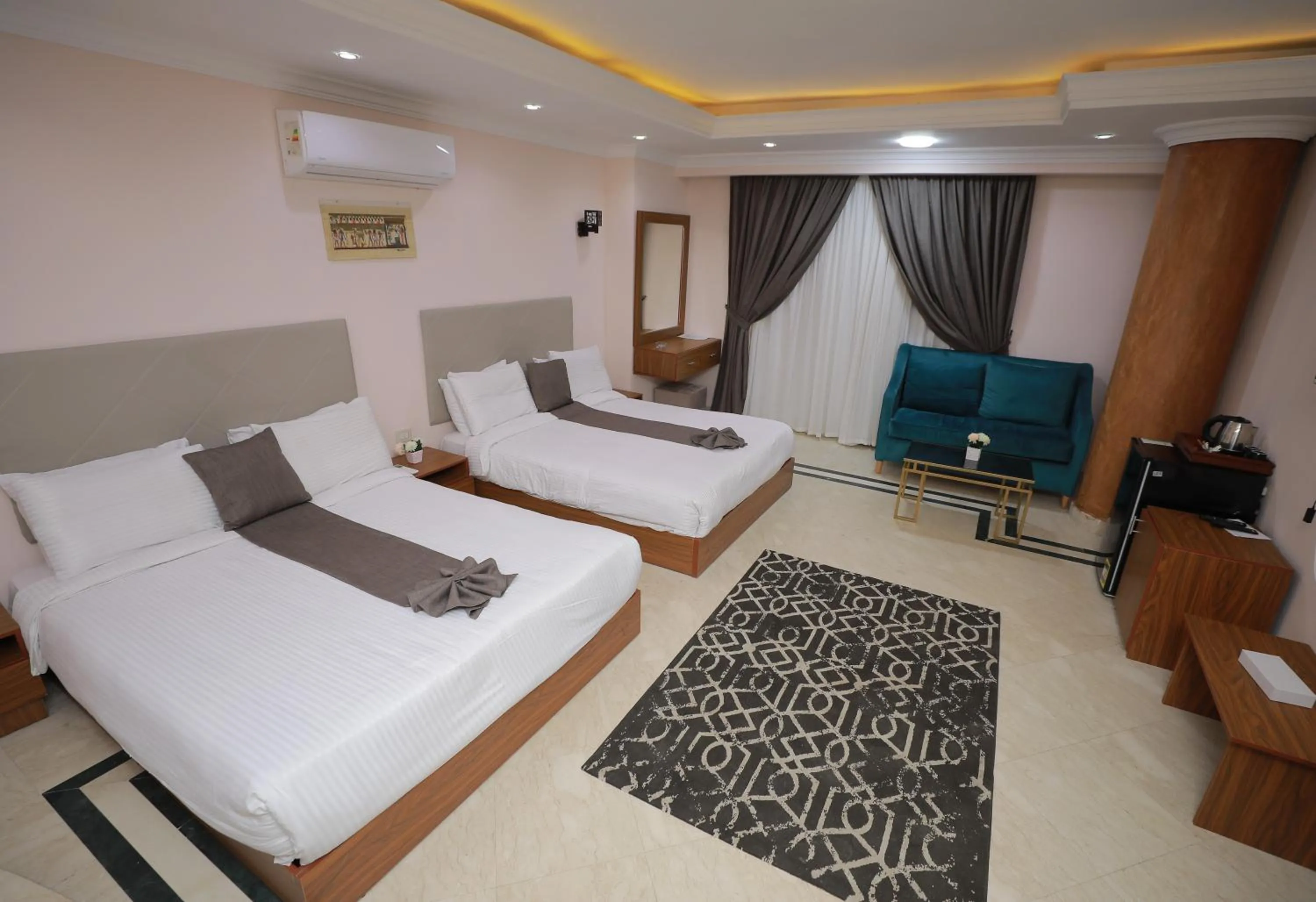 Bed in Aziz Egypt Pyramids Hotel
