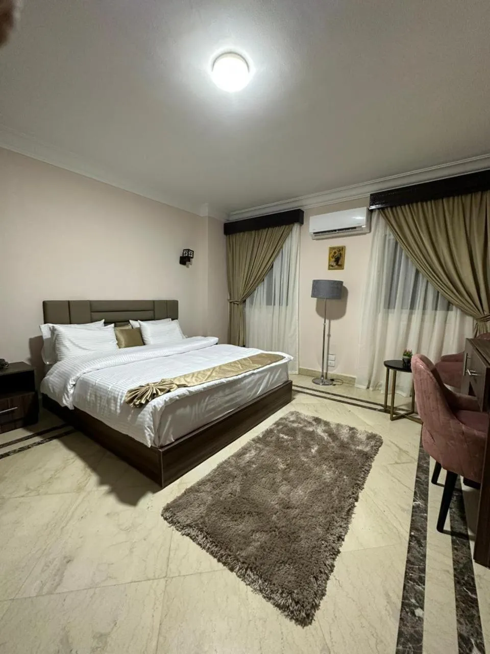 Bed in Aziz Egypt Pyramids Hotel