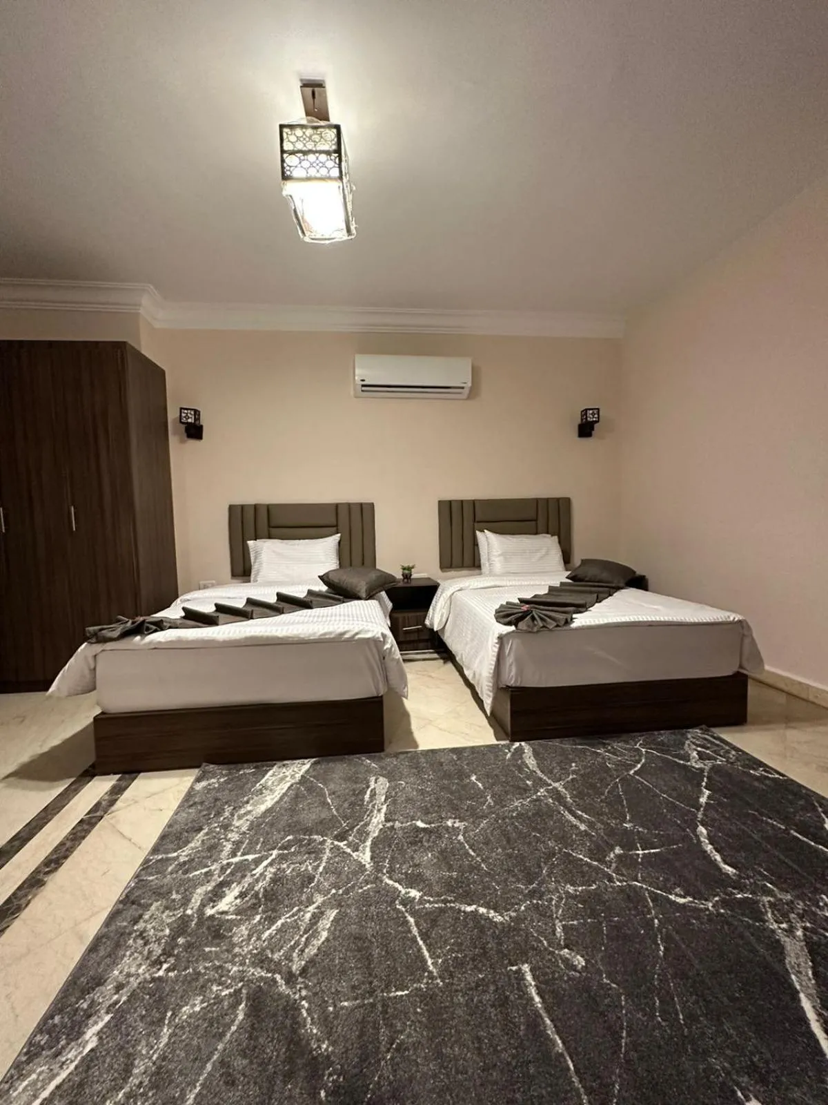 Bed in Aziz Egypt Pyramids Hotel