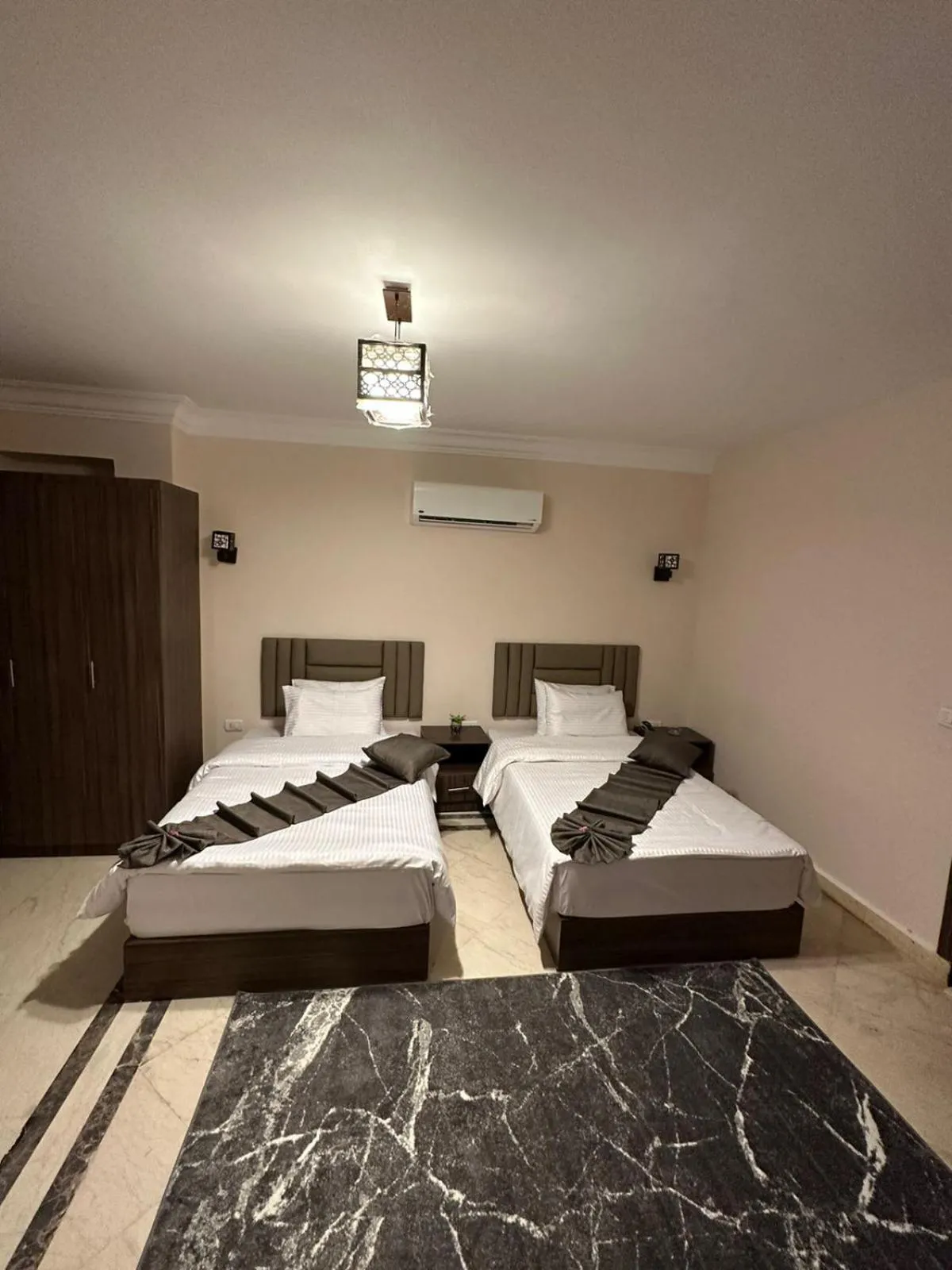 Photo of the whole room, Bed in Aziz Egypt Pyramids Hotel