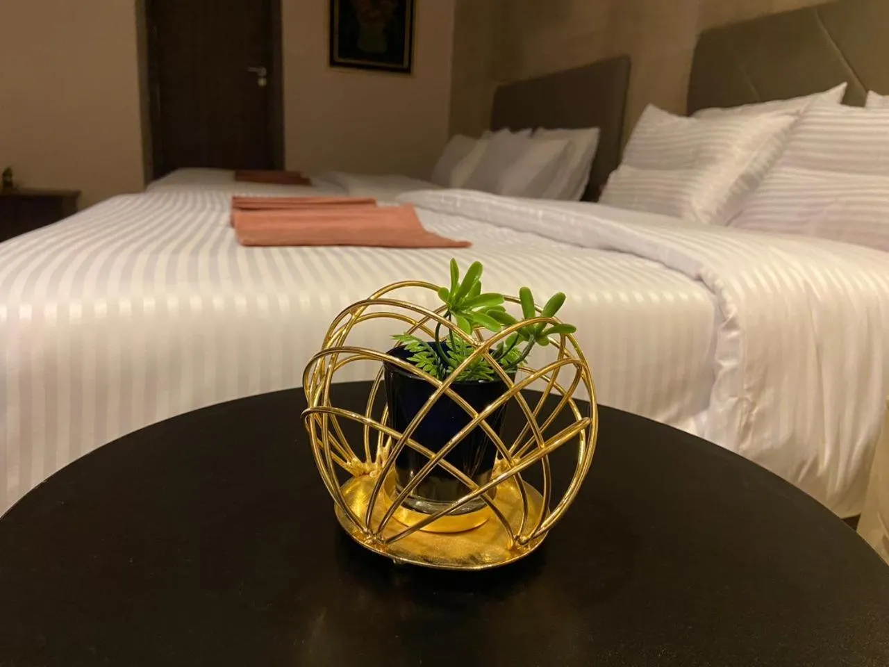 Bed in Aziz Egypt Pyramids Hotel