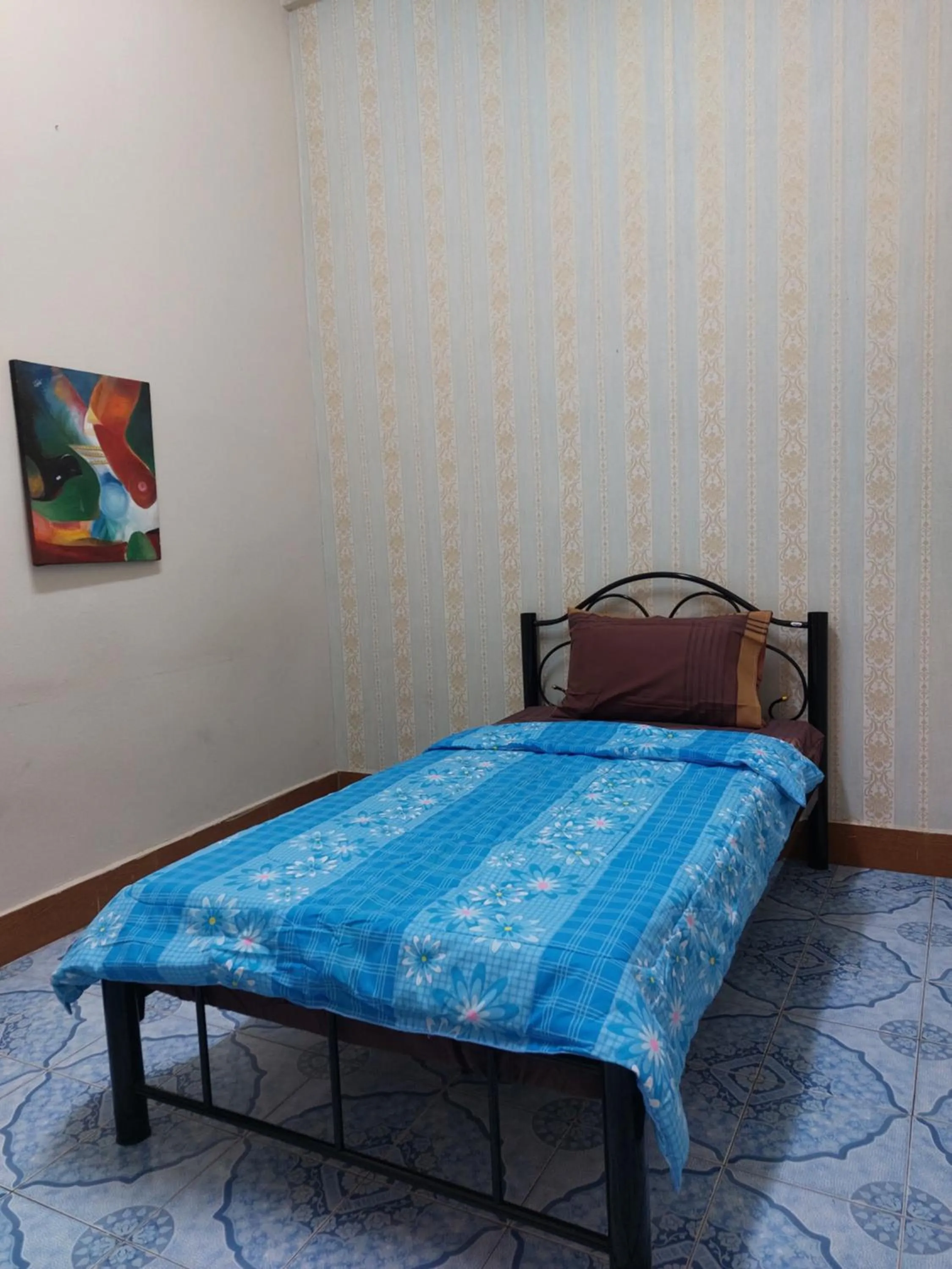 Bed in Mabuhay Guest House, Thai Embassy Vientiane