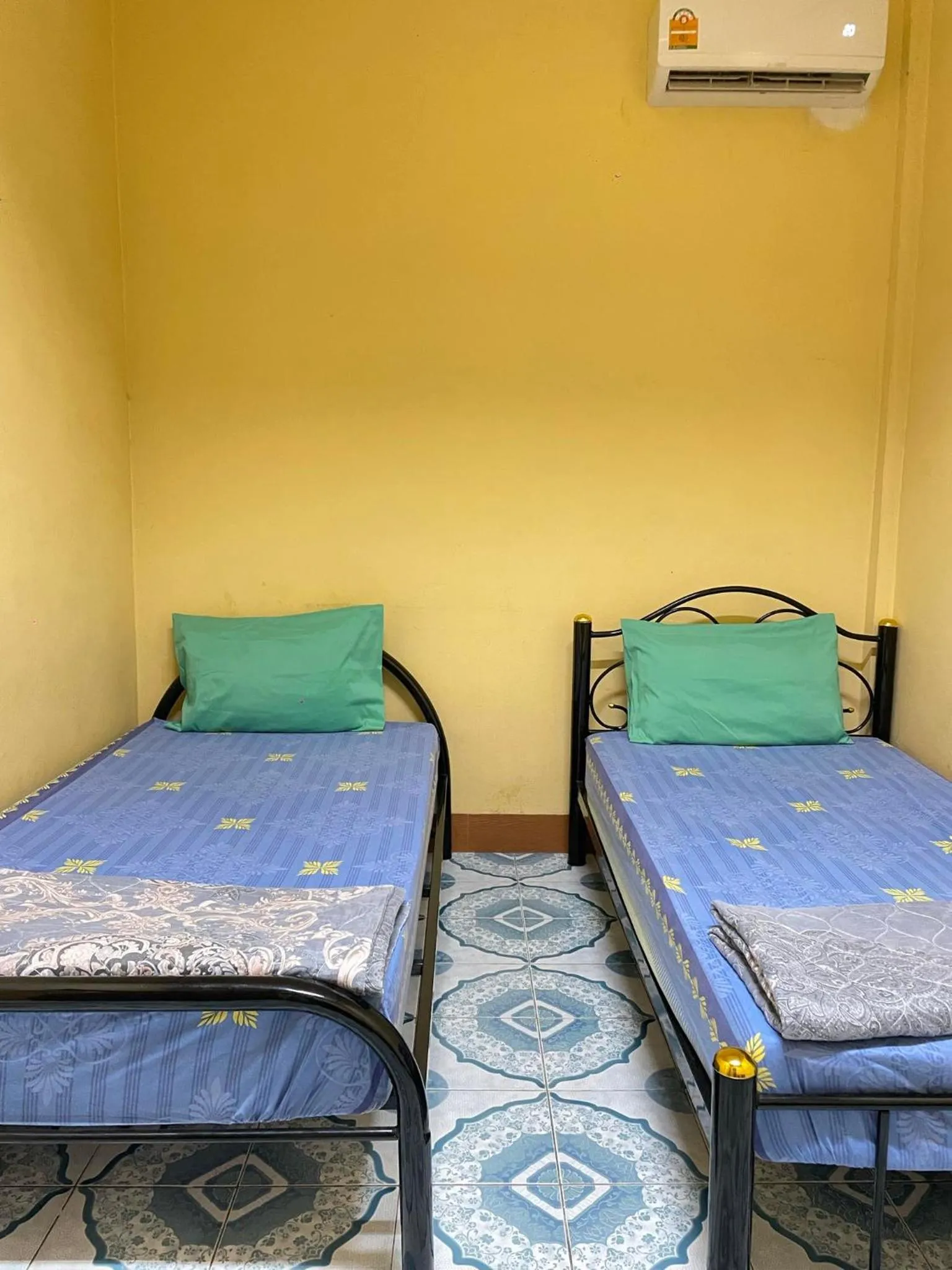 Bed in Mabuhay Guest House, Thai Embassy Vientiane