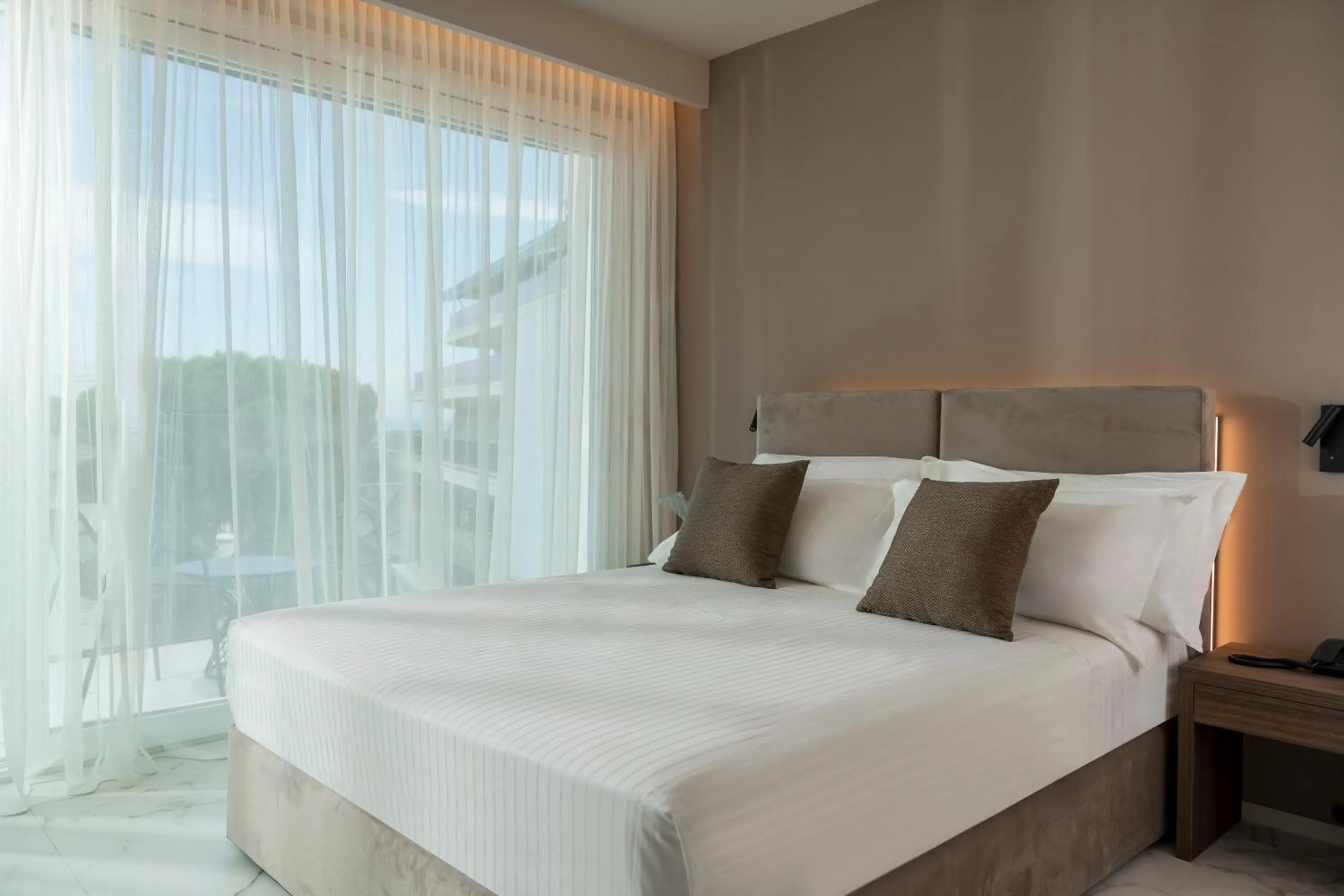 Bed in Bolina Suite & Spa