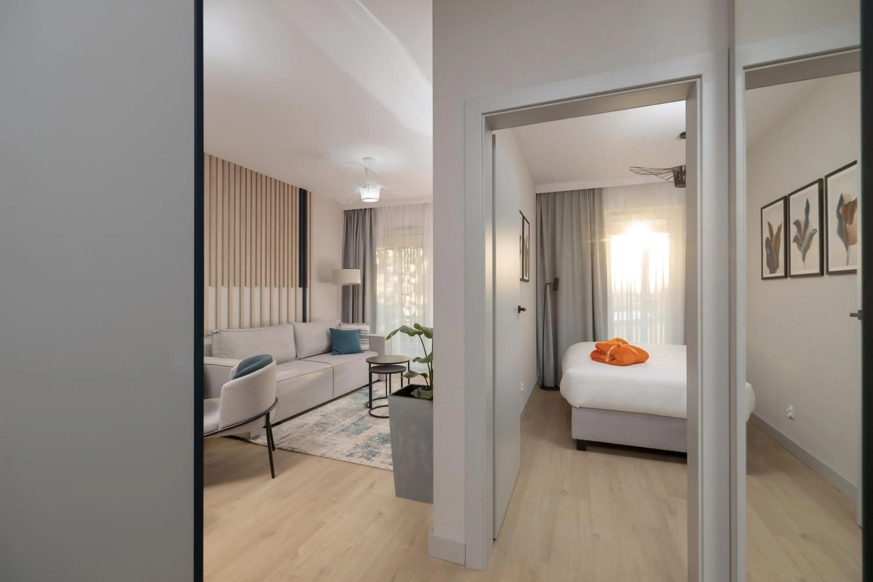 Living room, Bed in Baltic Waves Resort by PI Apartments - Official Operator