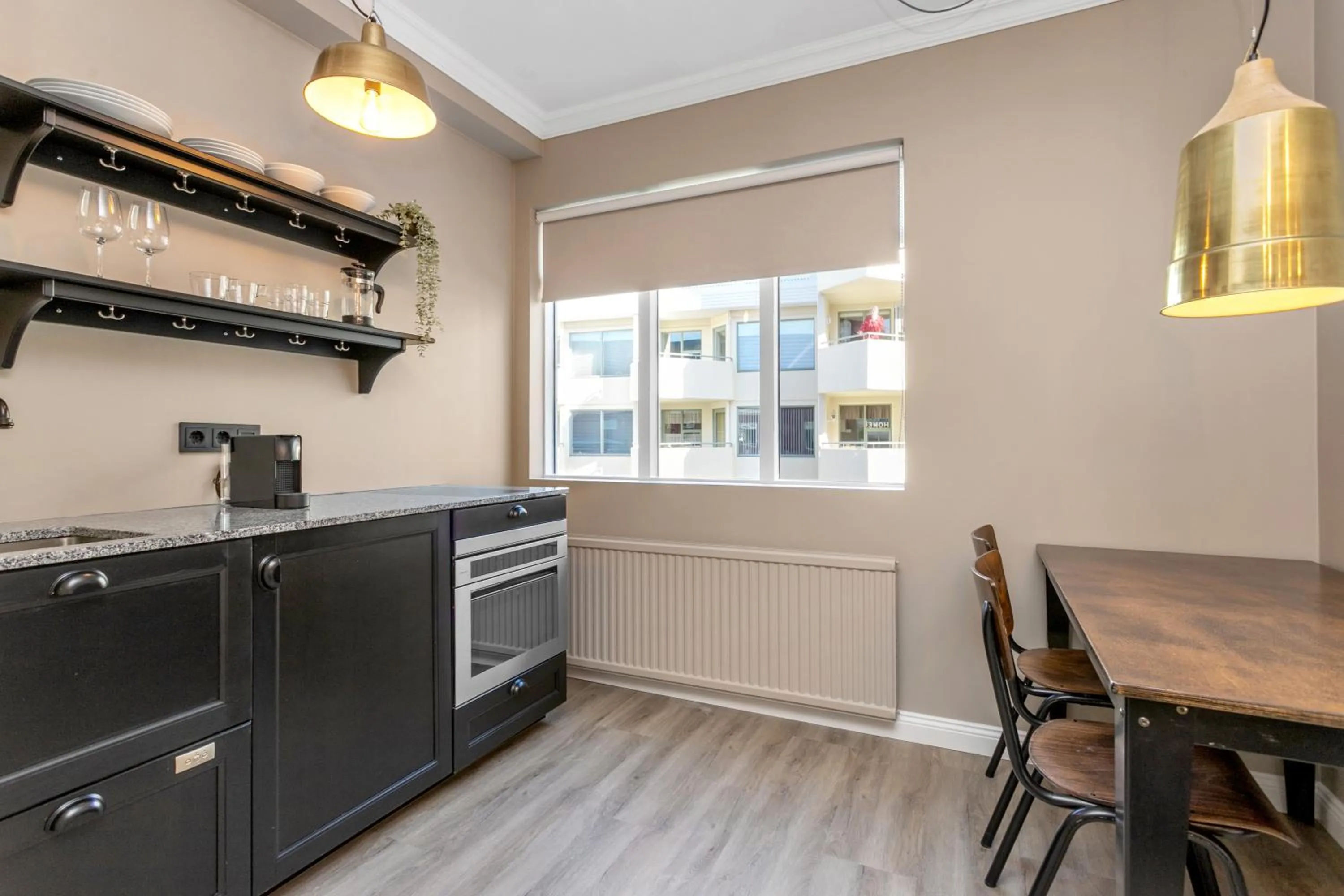 Kitchen or kitchenette in ODDSSON Downtown Hotel