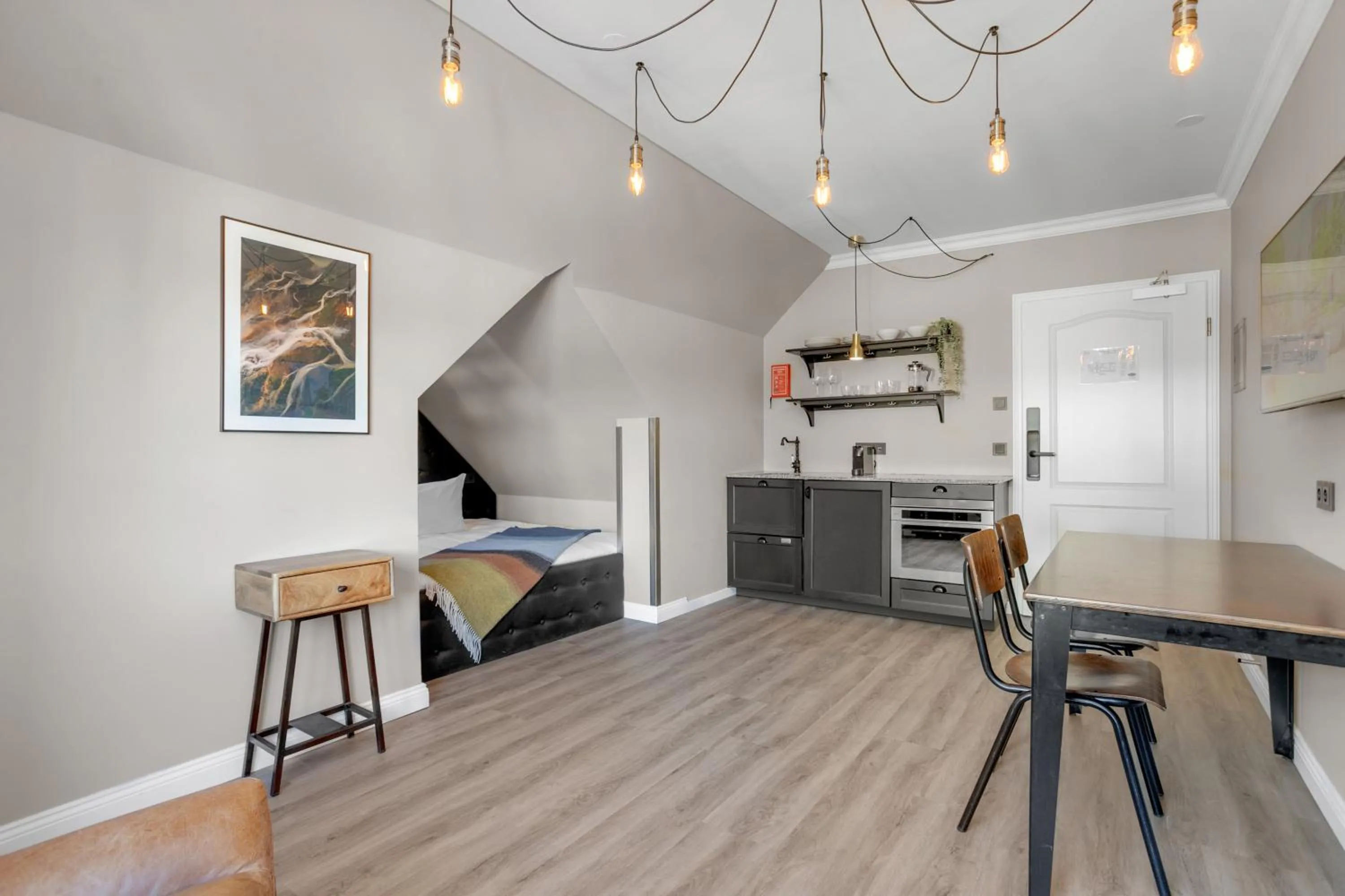 Kitchen or kitchenette in ODDSSON Downtown Hotel