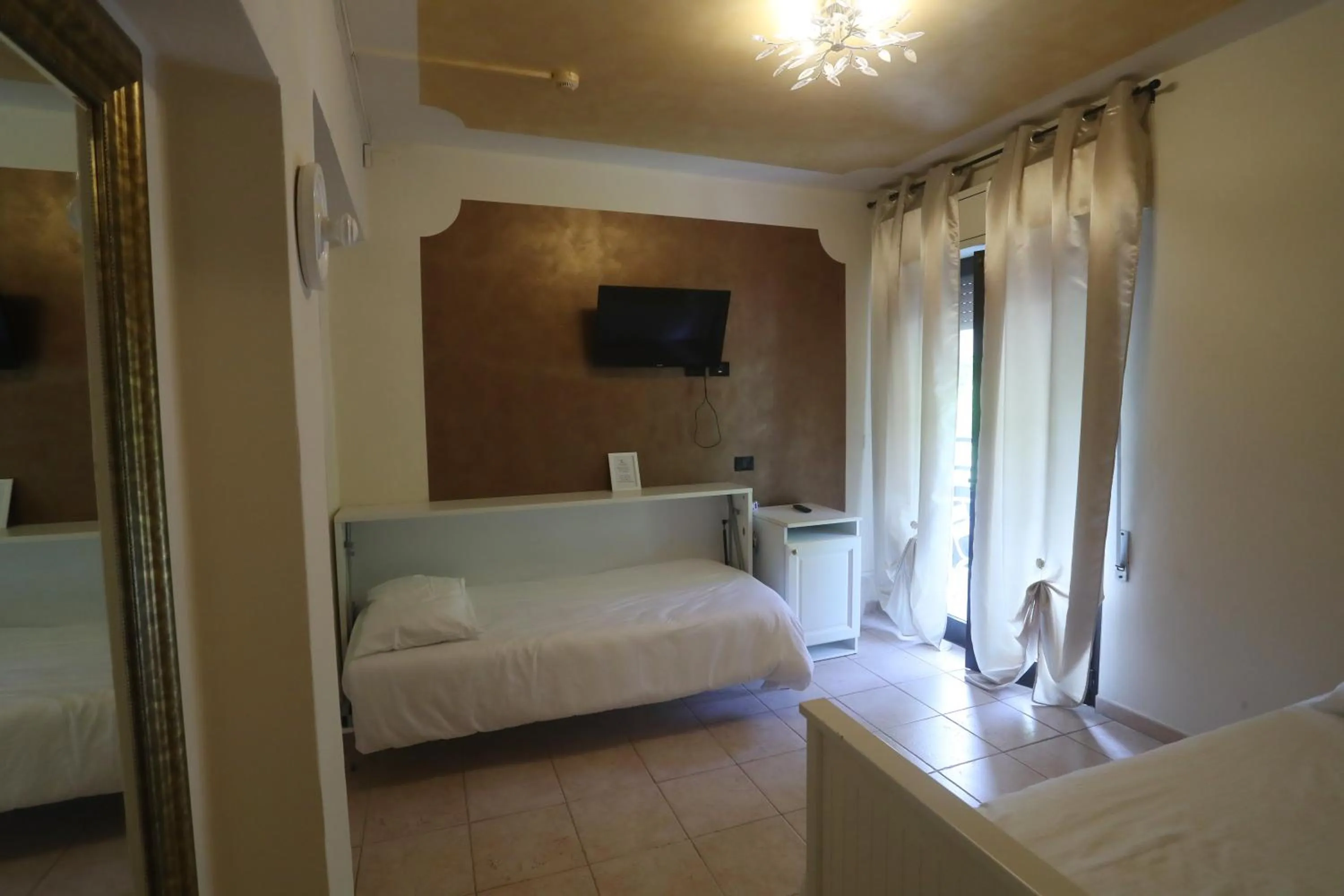 Bed in Hotel Central Giacomini