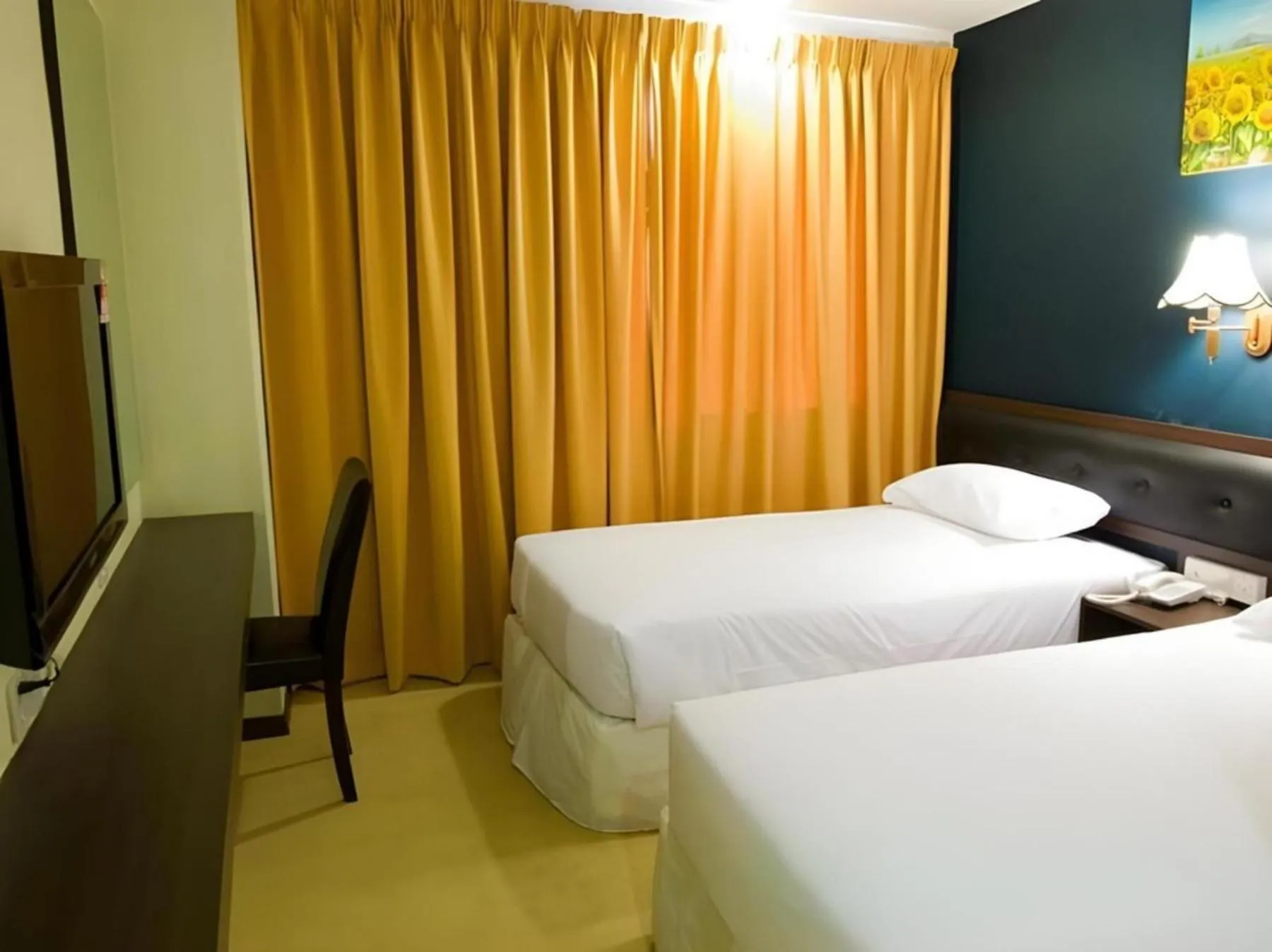 Bed in Syaz Meridien Hotel