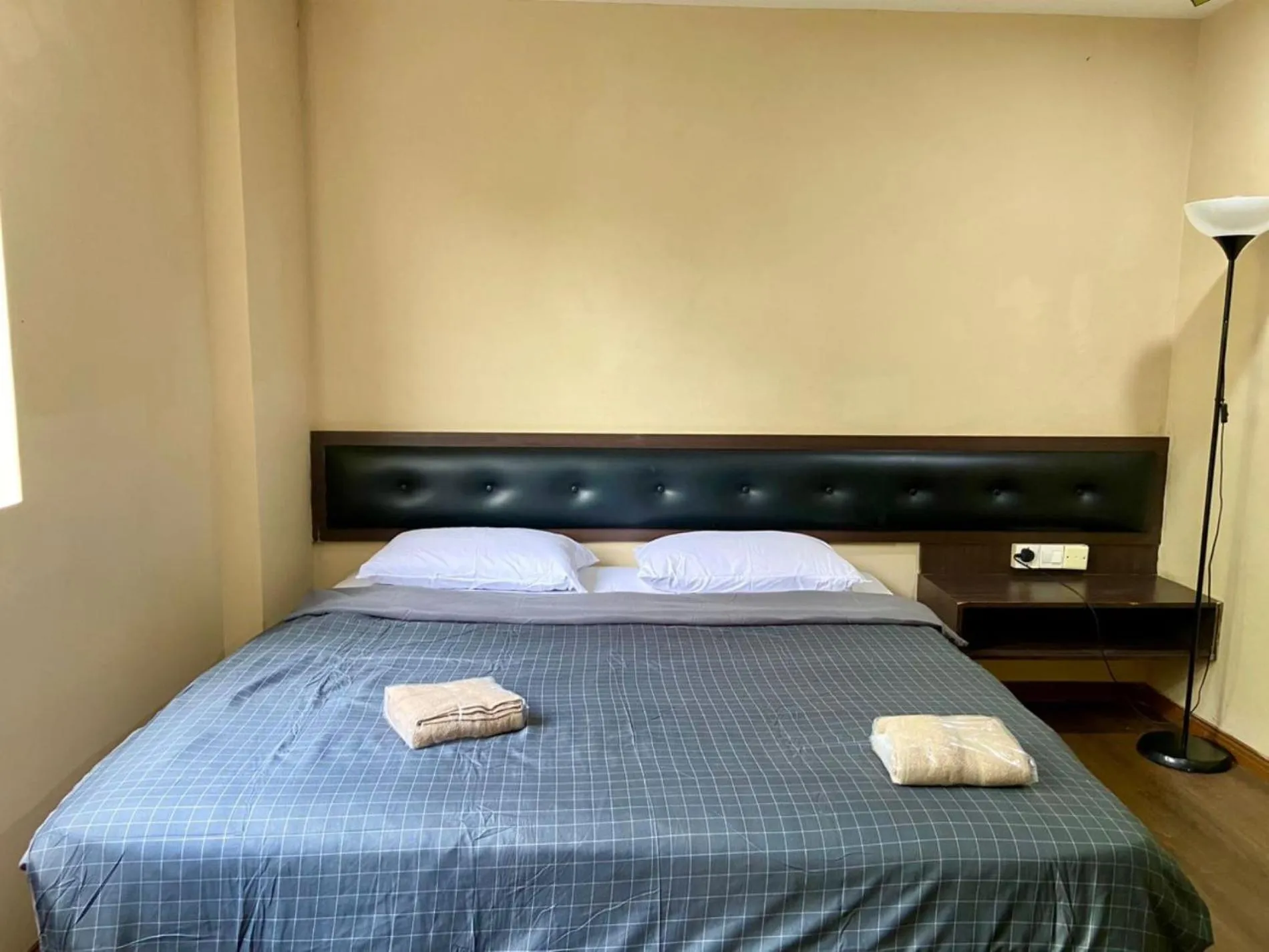 Bed in Syaz Meridien Hotel