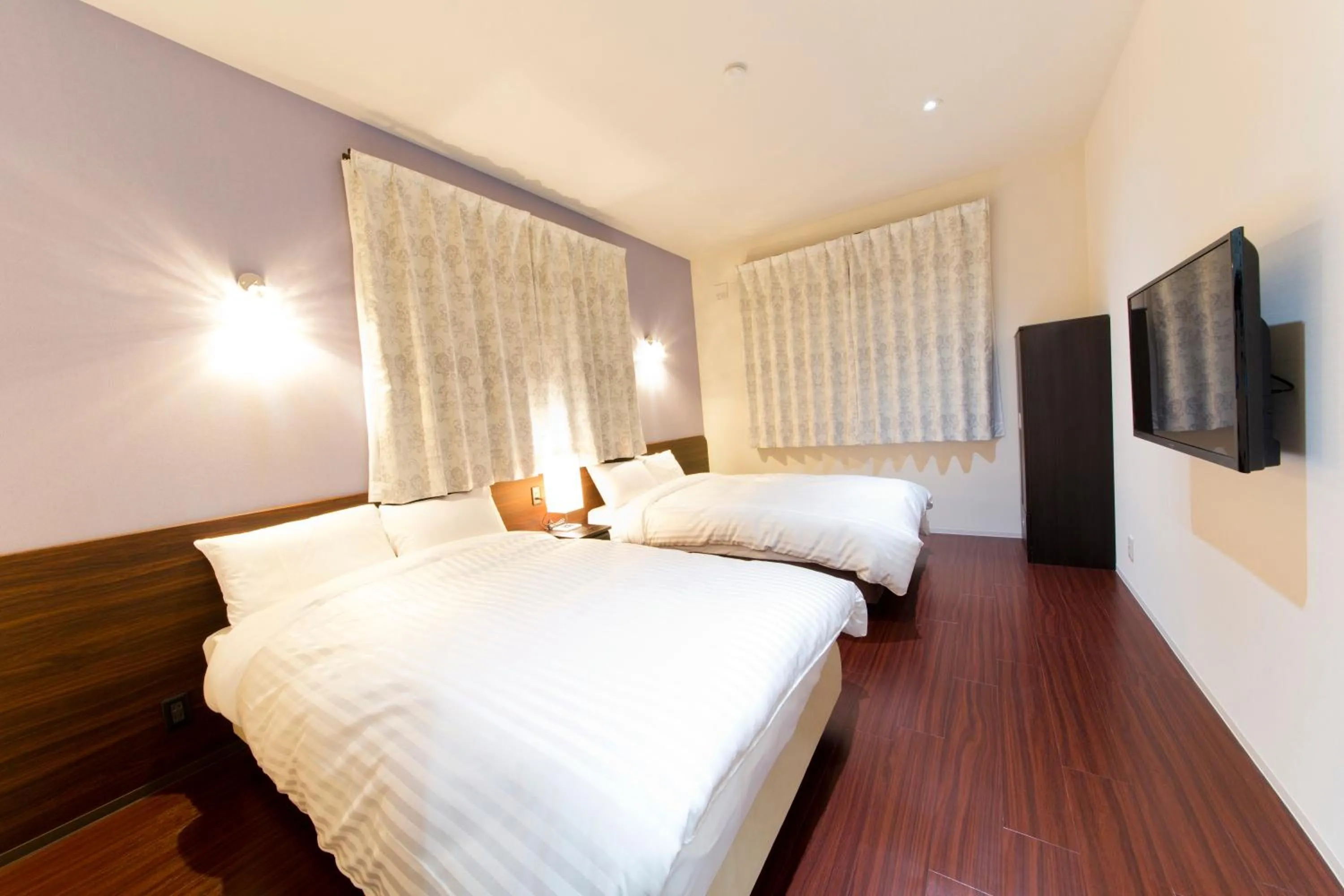 Bed in AIRAIKUHOTEL kagoshima