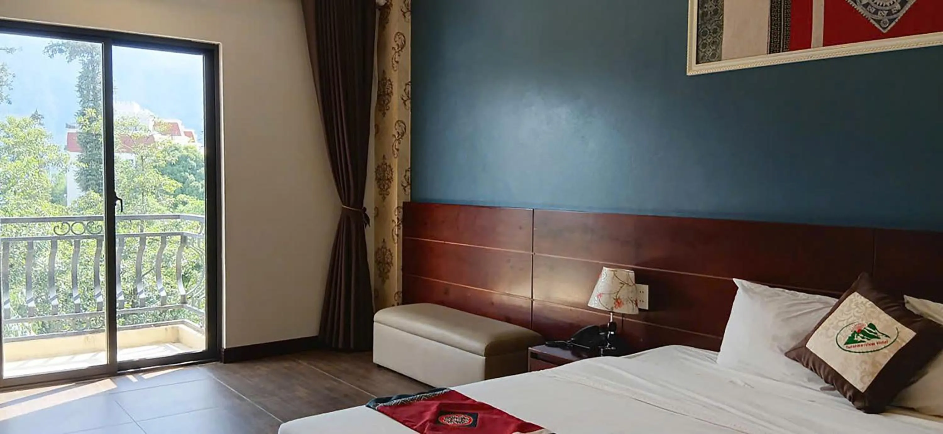 Bed in Sunshine View Sapa Hotel