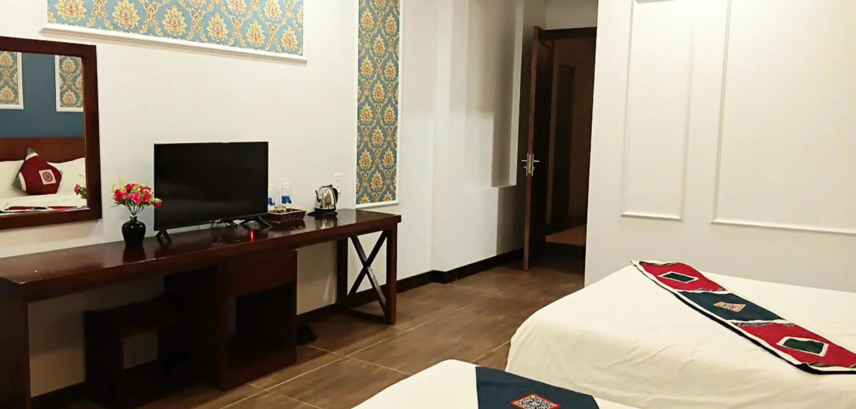 TV and multimedia, Bed in Sunshine View Sapa Hotel