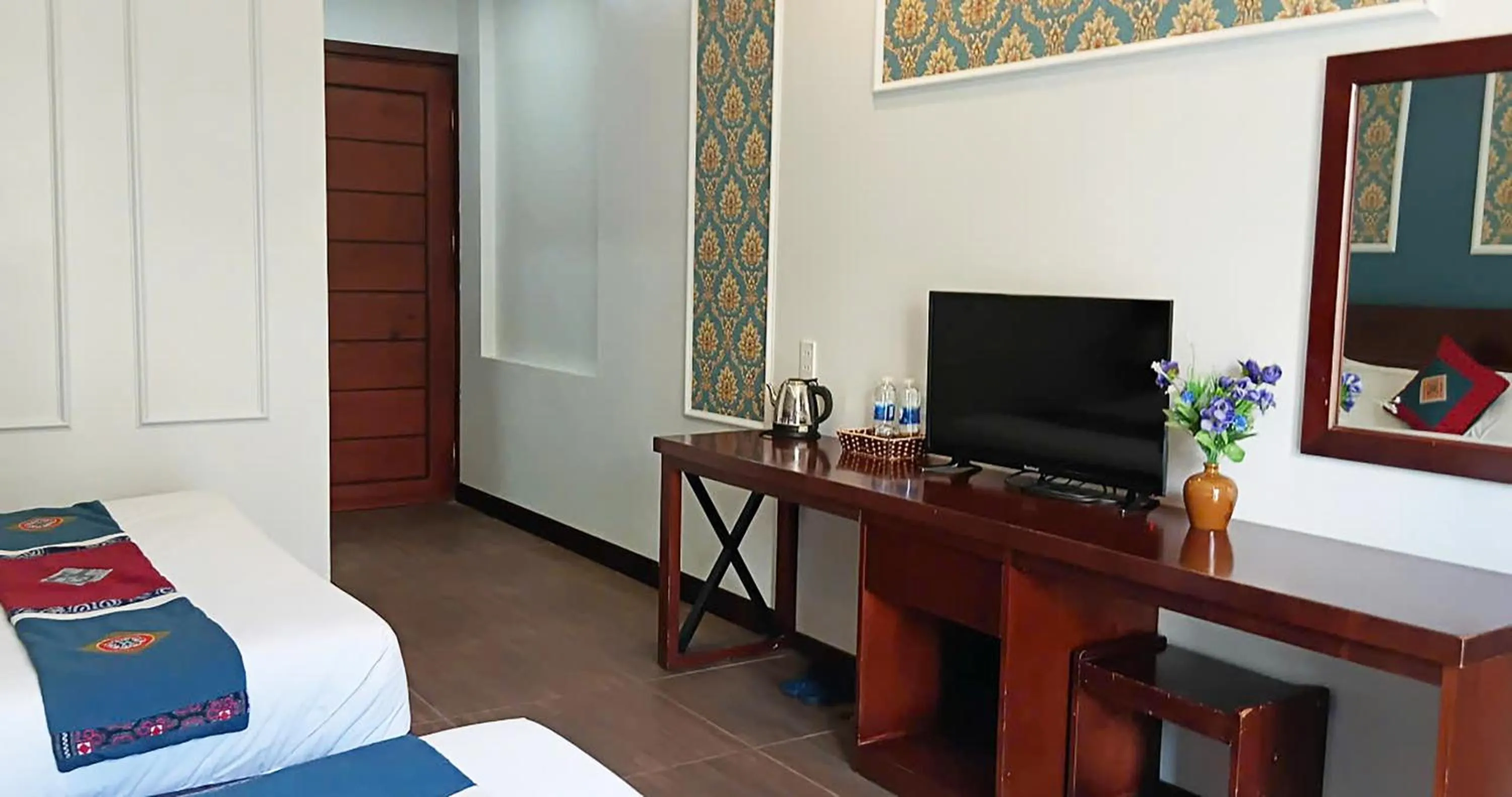 Communal lounge/ TV room, Bed in Sunshine View Sapa Hotel