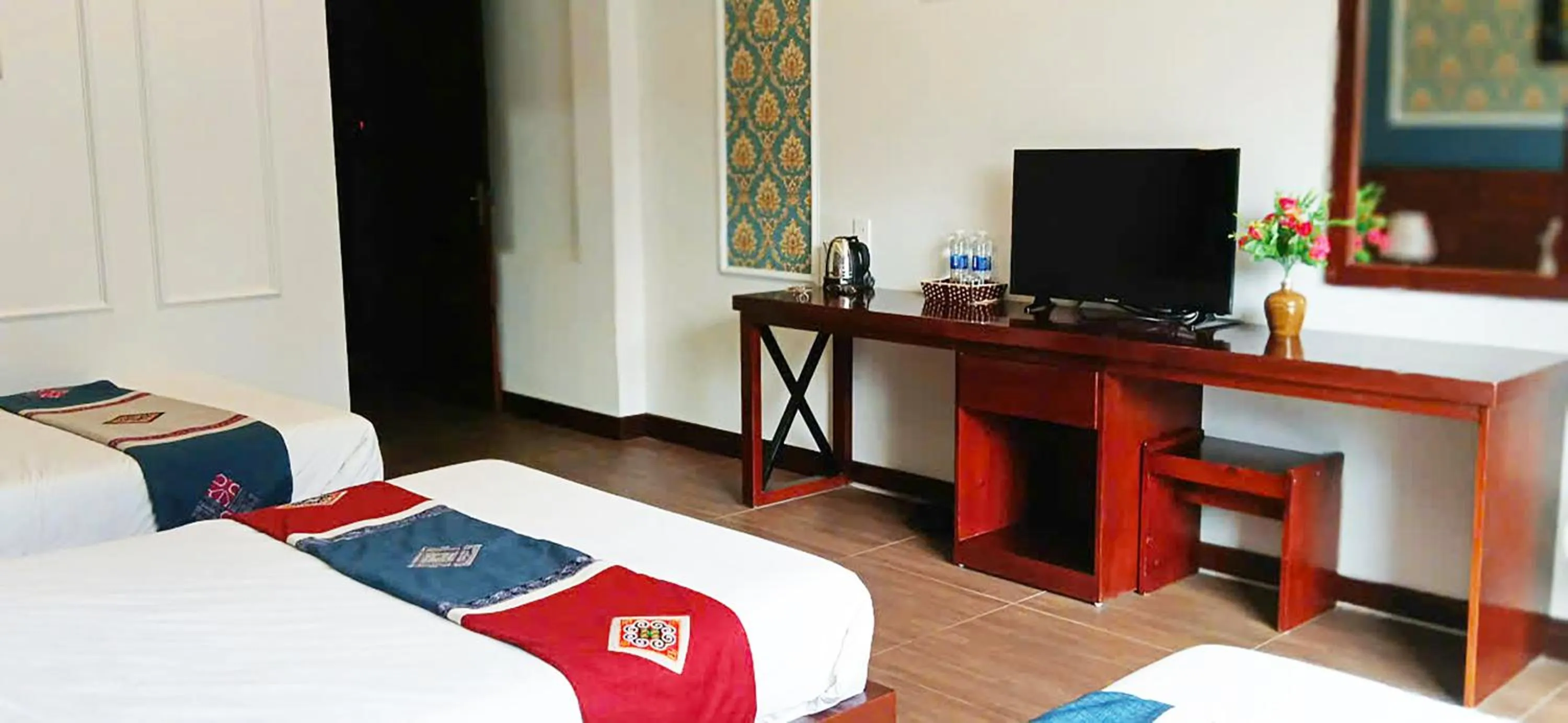 TV and multimedia, Bed in Sunshine View Sapa Hotel