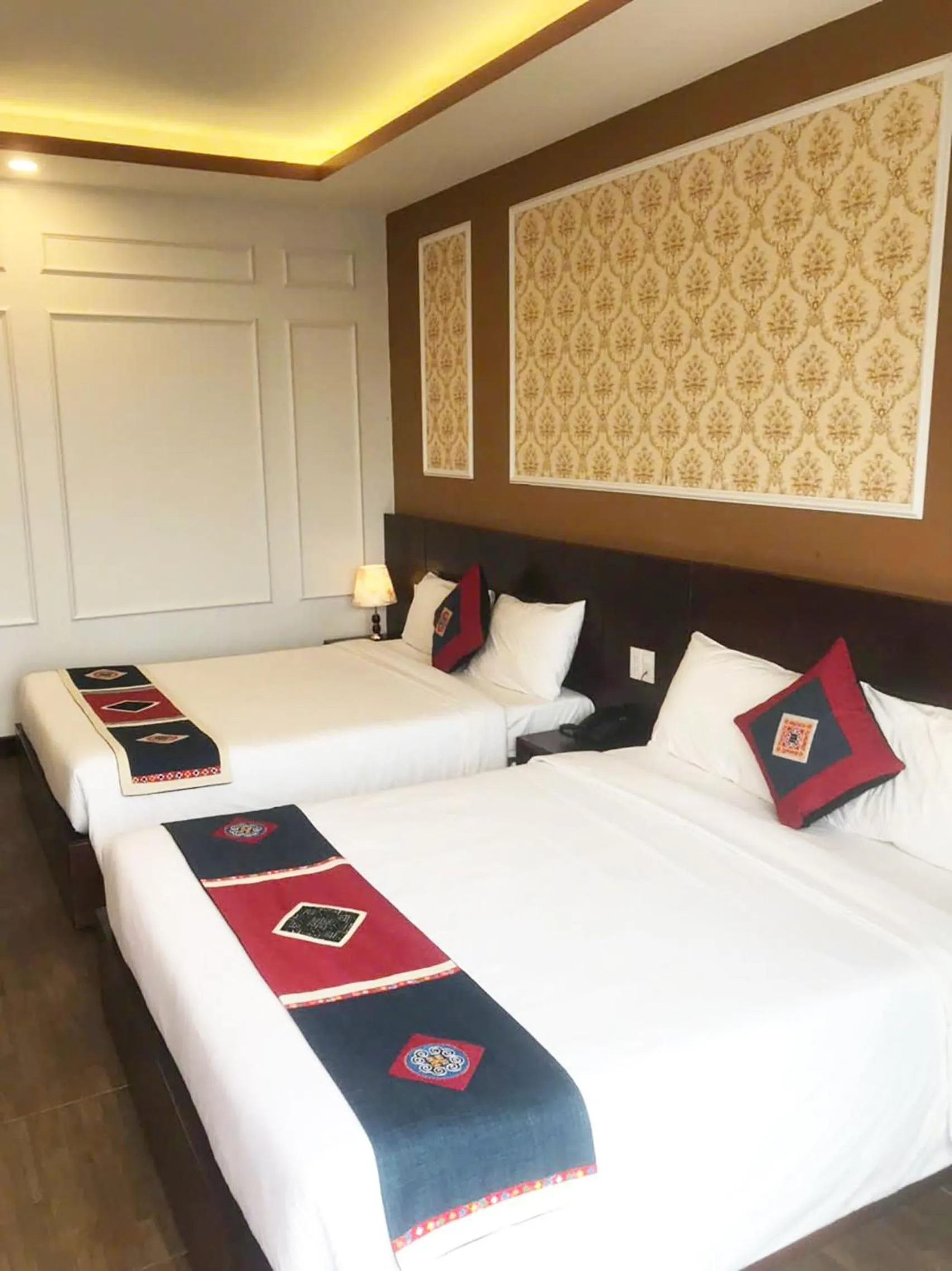Bed in Sunshine View Sapa Hotel