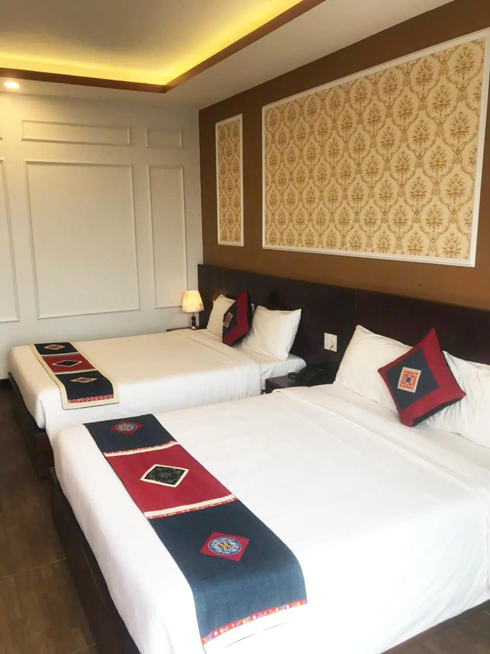 Bed in Sunshine View Sapa Hotel