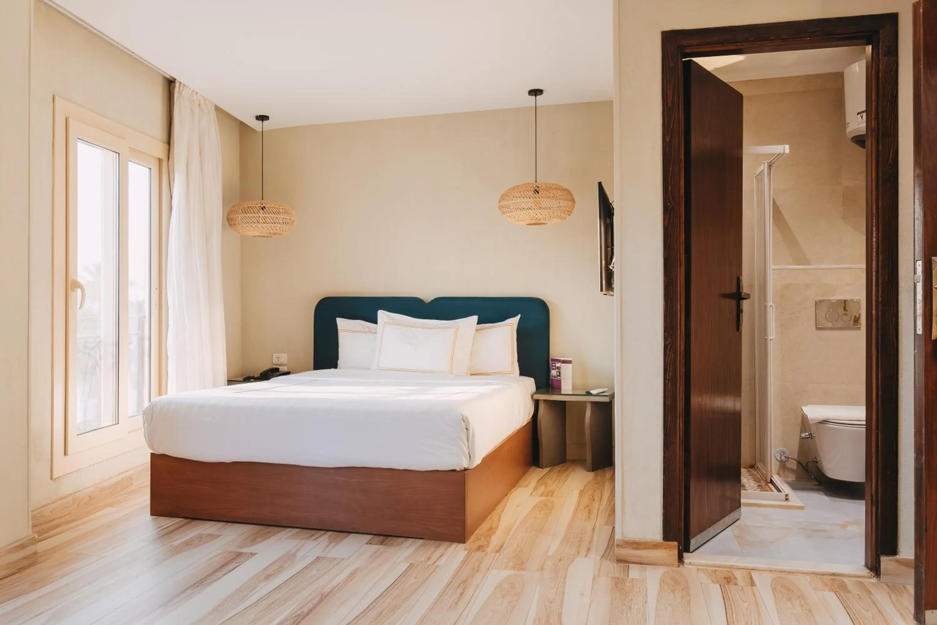 Bed in BrassAlmas Pyramids Hotel