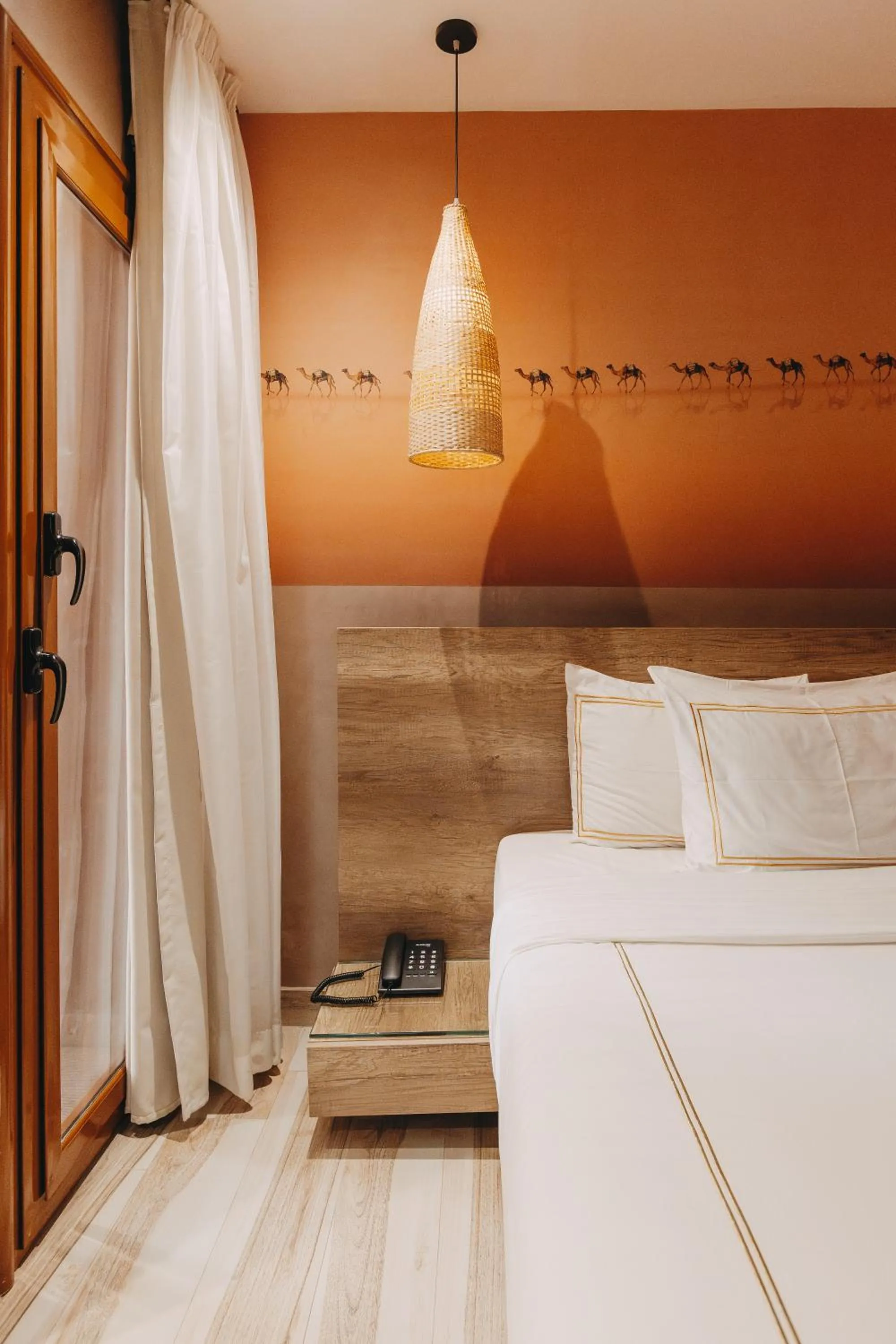 Bed in BrassAlmas Pyramids Hotel