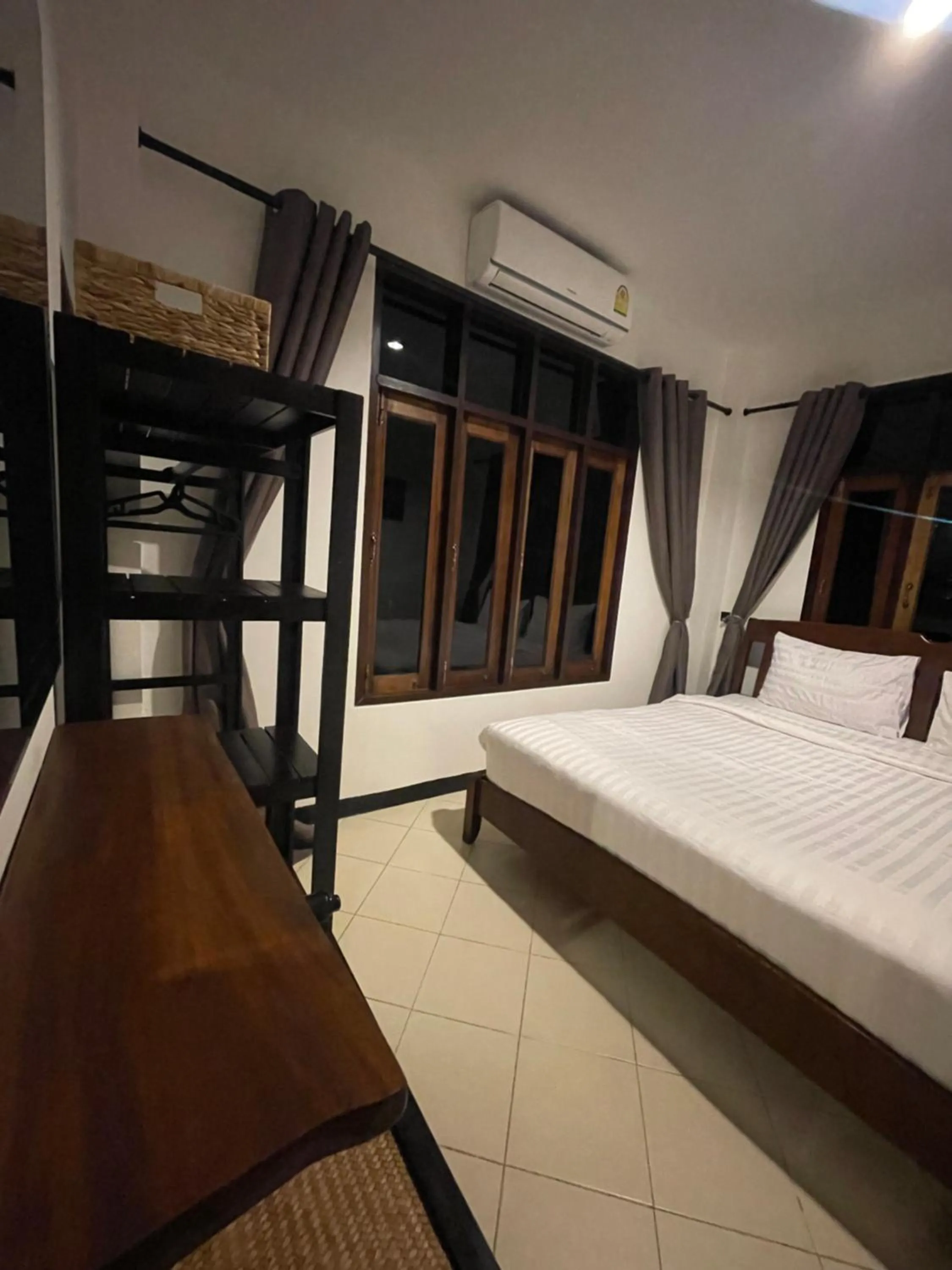 Bed in Aisawan Resort villa
