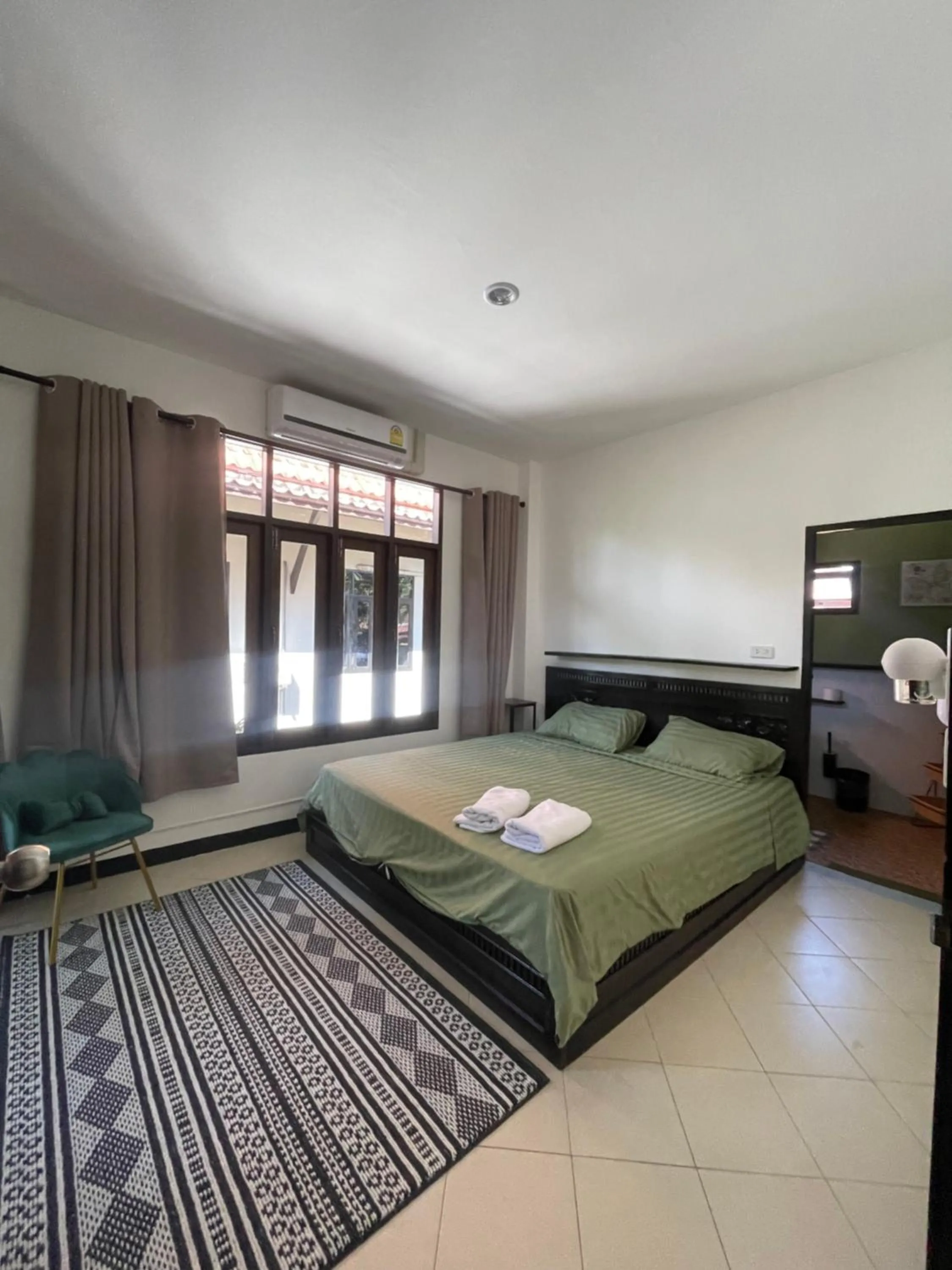 Bed in Aisawan Resort villa